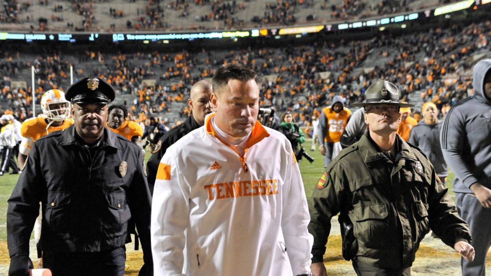 Nov 22, 2014; Knoxville, TN, USA; Tennessee Volunteers head coach Butch Jones leaves the field after his team lost to the Missouri Tigers during the second half at Neyland Stadium. Missouri won 29-21. Mandatory Credit: Jim Brown-USA TODAY Sports