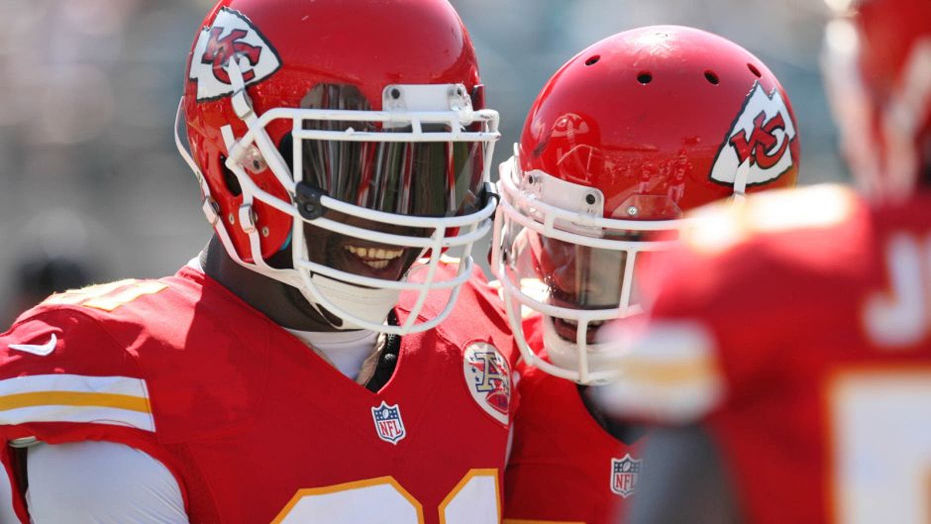 Sep 8, 2013; Jacksonville, FL, USA; Kansas City Chiefs outside linebacker Tamba Hali (91) reacts after running an interception back for a touchdown during the game against the Jacksonville Jaguars at EverBank Field. Mandatory Credit: Rob Foldy-USA TODAY Sports