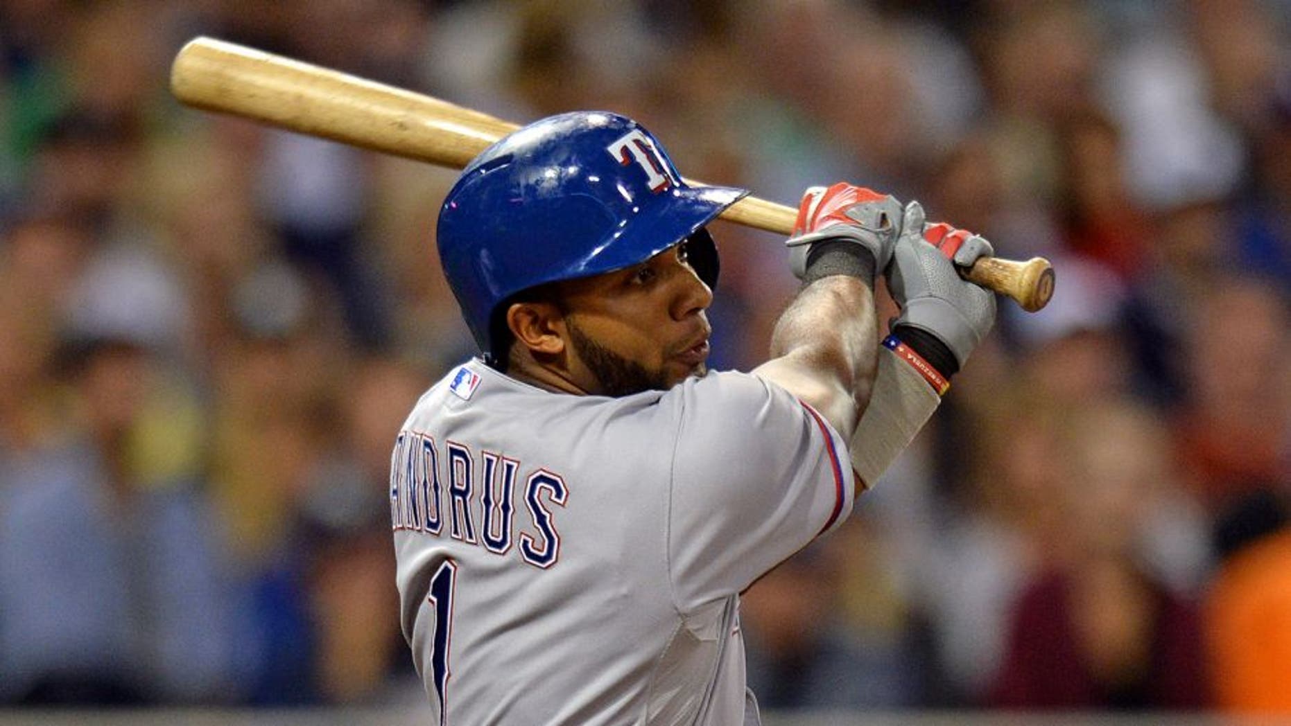 Sep 1, 2015; San Diego, CA, USA; Texas Rangers shortstop Elvis Andrus (1) hits an RBI single during the seventh inning against the San Diego Padres at Petco Park. Mandatory Credit: Jake Roth-USA TODAY Sports