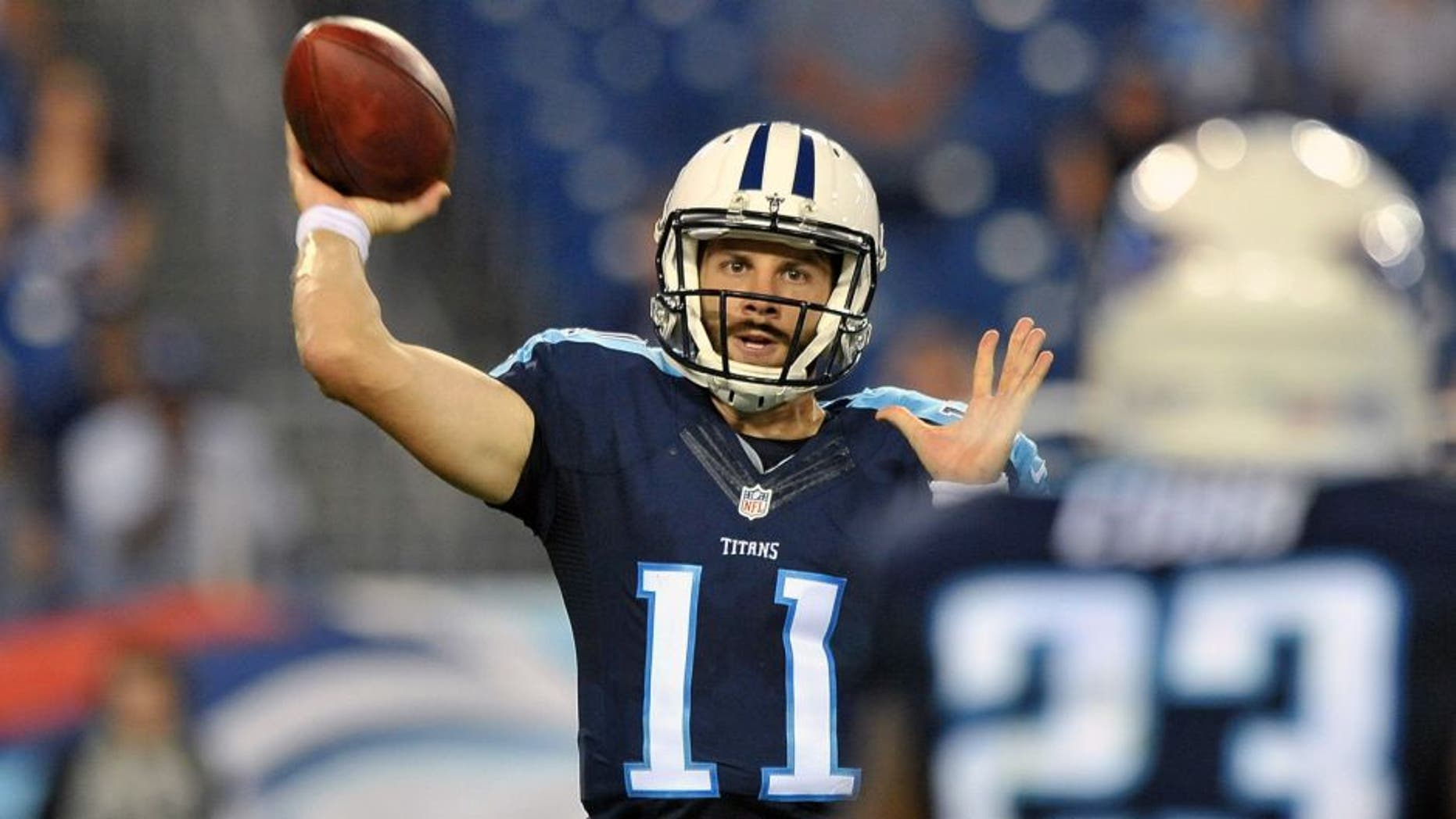 Aug 23, 2015; Nashville, TN, USA; Tennessee Titans quarterback Alex Tanney (11) passes against the St. Louis Rams during the second half at Nissan Stadium. Titans won 27-14. Mandatory Credit: Jim Brown-USA TODAY Sports