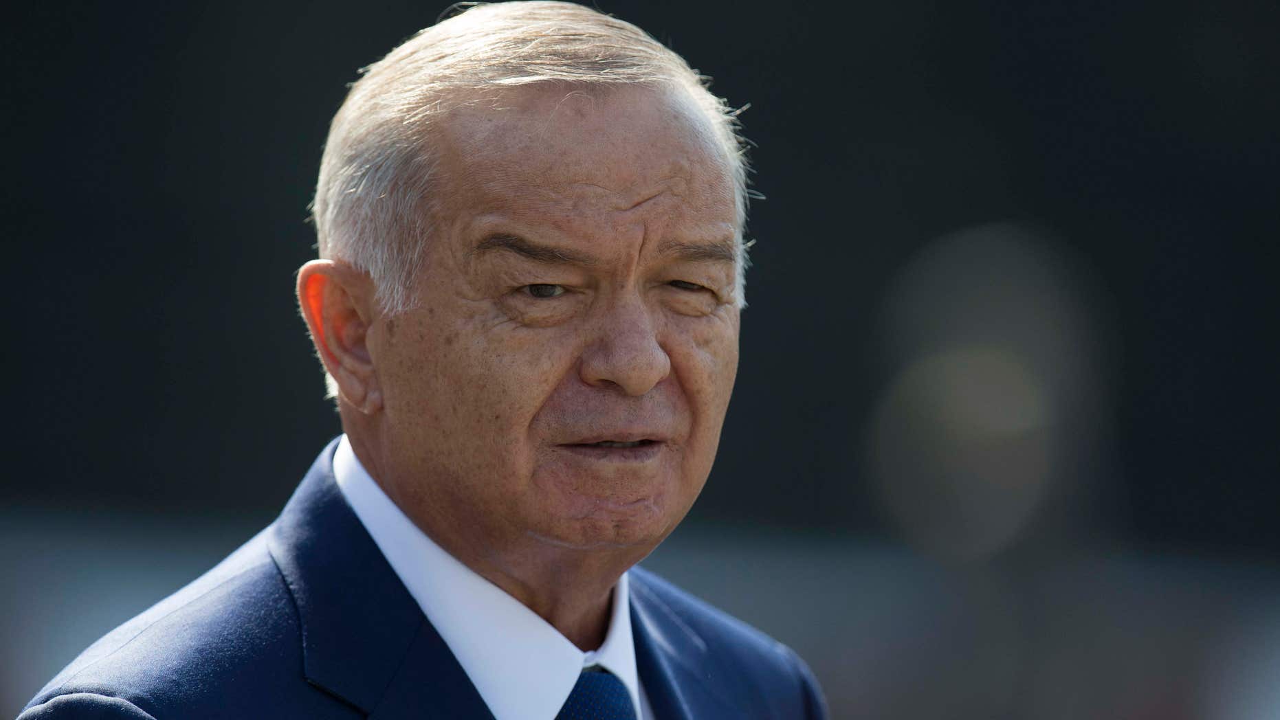 FILE - In this Monday, April 15, 2013 file photo, Uzbek President Islam Karimov leaves a wreath laying ceremony at the Tomb of Unknown Soldier in Moscow, Russia.