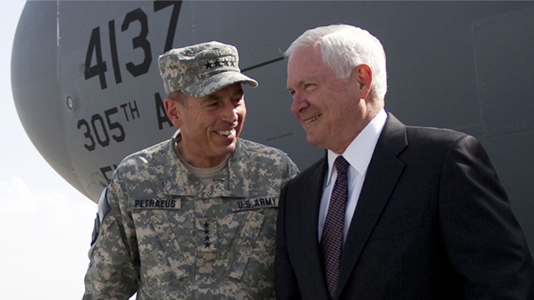 Sept. 2: Defense Secretary Robert Gates, right, is greeted by top NATO commander Gen. David Petraeus as he arrives in Kabul.