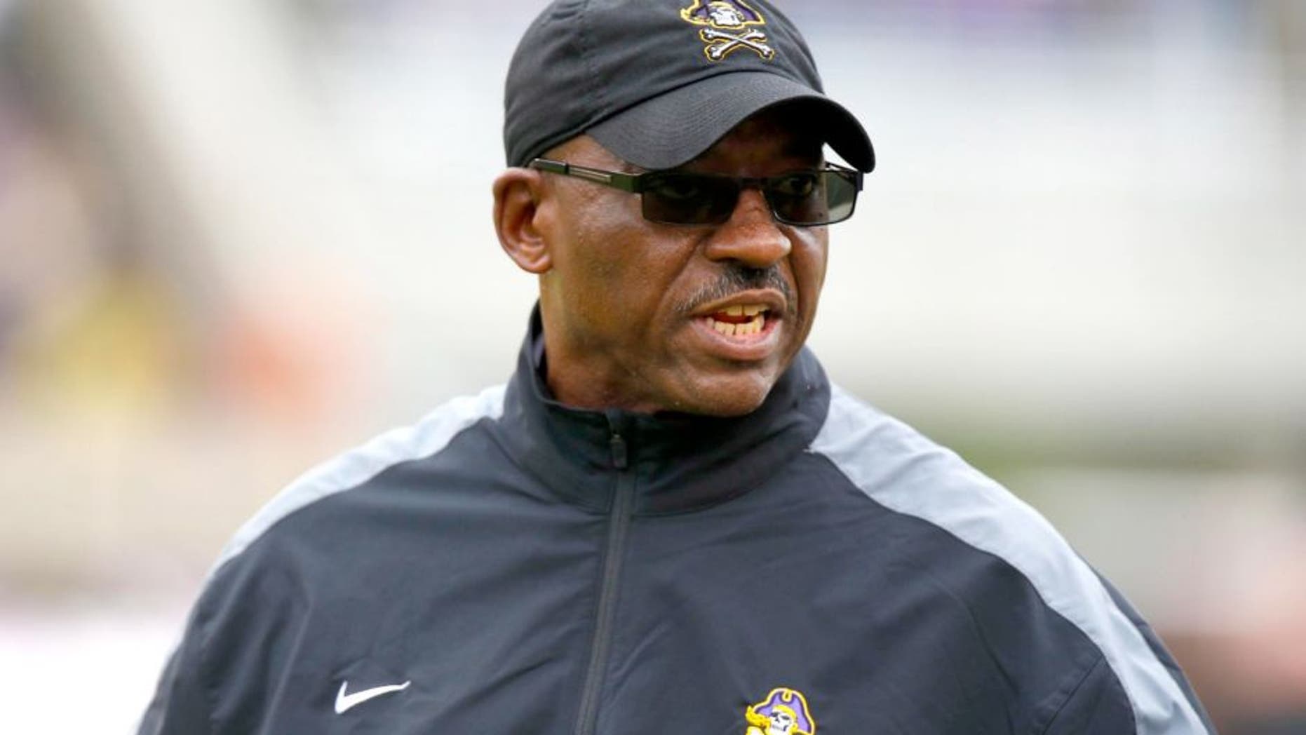 October 19, 2013; Greenville, NC, USA; East Carolina Pirates head coach Ruffin McNeill looks on against the Southern Mississippi Golden Eagles at Dowdy-Ficklen Stadium. East Carolina Pirates defeated Southern Mississippi Golden Eagles 55-14. Mandatory Credit: James Guillory-USA TODAY Sports