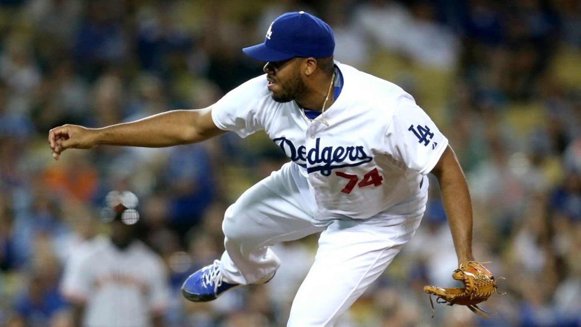 LOS ANGELES, CA - SEPTEMBER 01: Closer Kenley Jansen #74 of the Los Angeles Dodgers throws a pitch in the ninth inning on his way to getting the save against the San Francisco Giants at Dodger Stadium on September 1, 2015 in Los Angeles, California (Photo by Stephen Dunn/Getty Images)