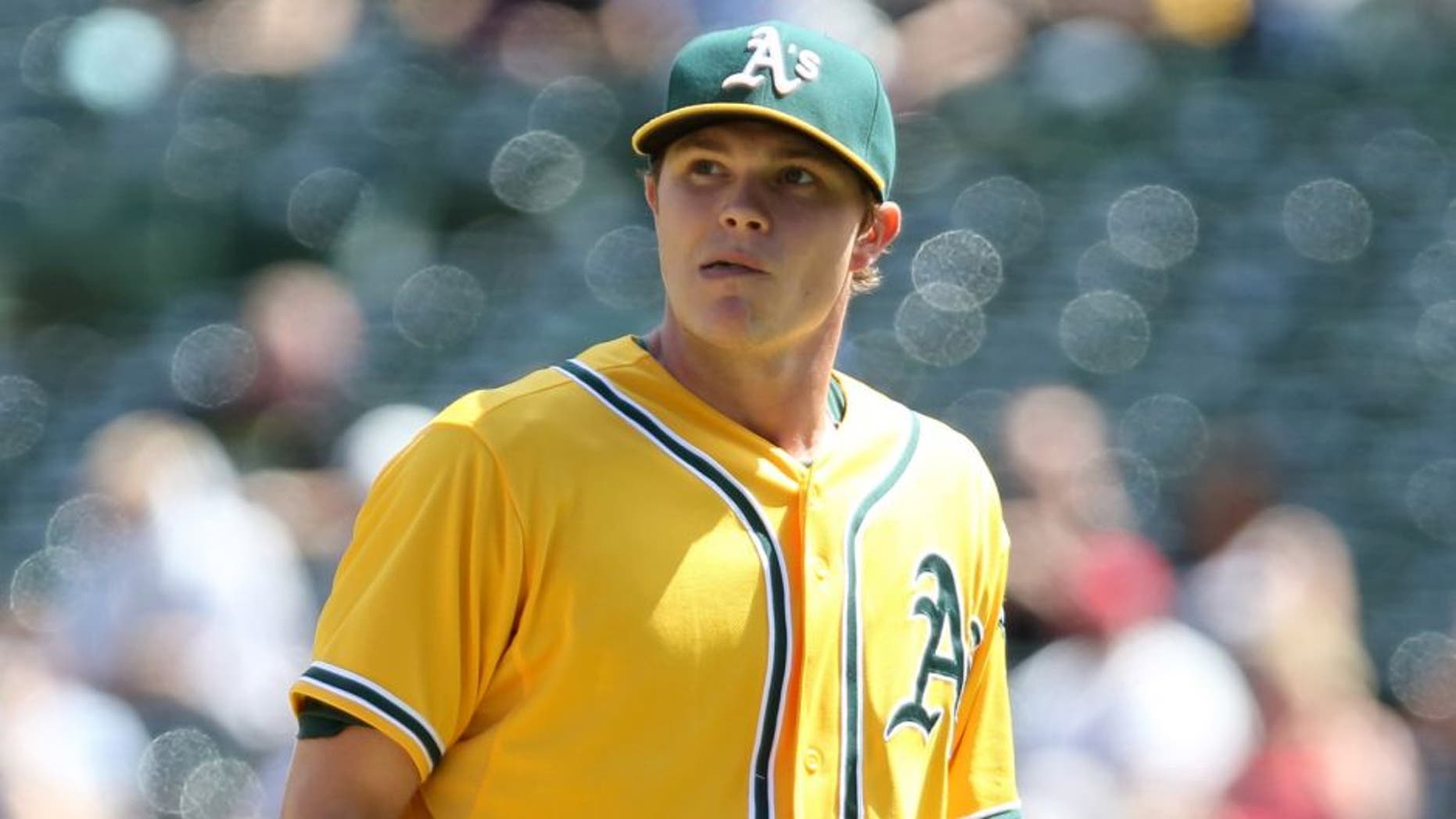 Sep 2, 2015; Oakland, CA, USA; Oakland Athletics starting pitcher Sonny Gray (54) returns to the dugout after the top of the fourth inning against the Los Angeles Angels at O.co Coliseum. Mandatory Credit: Kelley L Cox-USA TODAY Sports