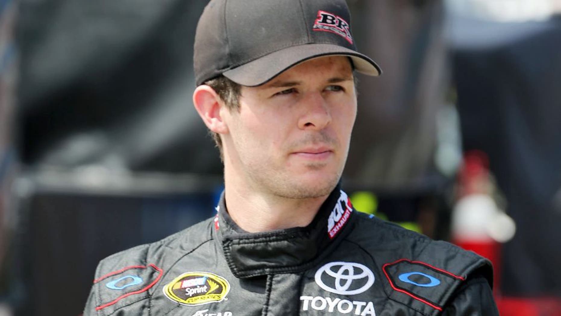 USA -Sep 5: Ryan Truex, driver of the #83 Burger King Toyota Camry, walks through the garage area during practice for the NASCAR Sprint Cup Series Federated Auto Parts 400 at the Richmond International Raceway in Richmond, VA. Picture taken on Sep 5, 2014 in the United States. (Photo by Jim Fluharty/NASCAR Illustrated/Sporting News via Getty Images)