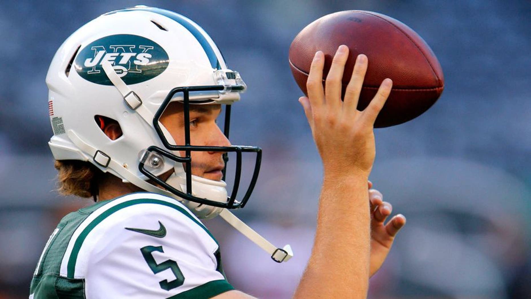 Aug 21, 2015; East Rutherford, NJ, USA; New York Jets quarterback Matt Flynn (5) during warm up before game against the Atlanta Falcons at MetLife Stadium. Mandatory Credit: Noah K. Murray-USA TODAY Sports