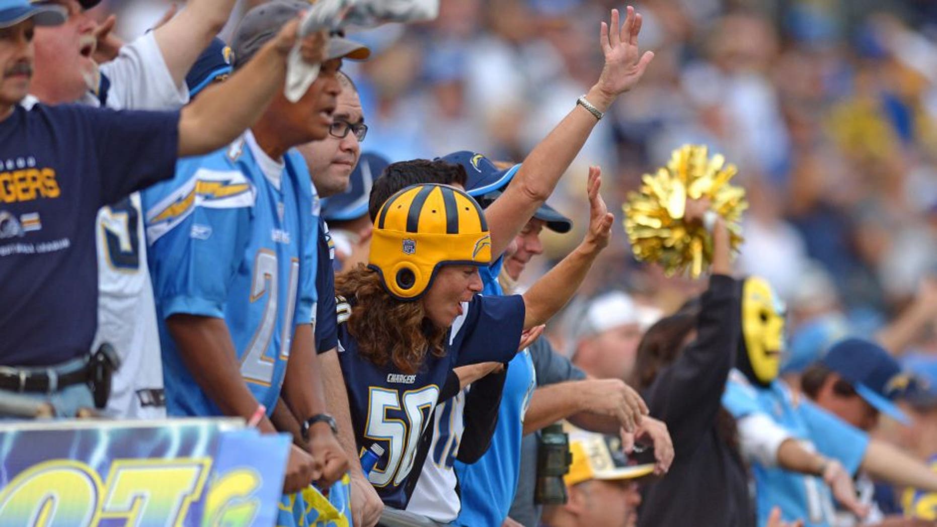 Nov 23, 2014; San Diego, CA, USA; San Diego Chargers fans cheer against the St. Louis Rams during the fourth quarter at Qualcomm Stadium. Mandatory Credit: Jake Roth-USA TODAY Sports