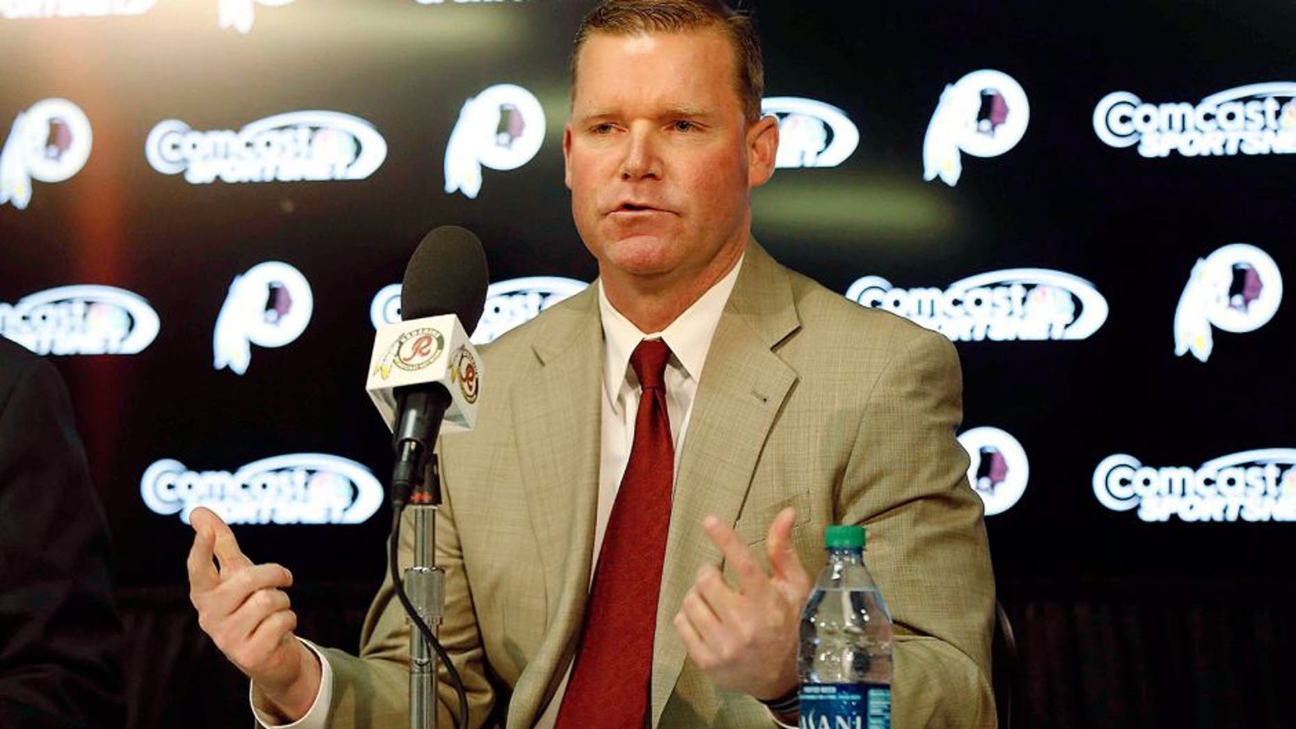 Jan 9, 2015; Ashburn, VA, USA; Washington Redskins new general manager Scot McCloughan (right) speaks during his introductory press conference at Redskins Park. Mandatory Credit: Geoff Burke-USA TODAY Sports