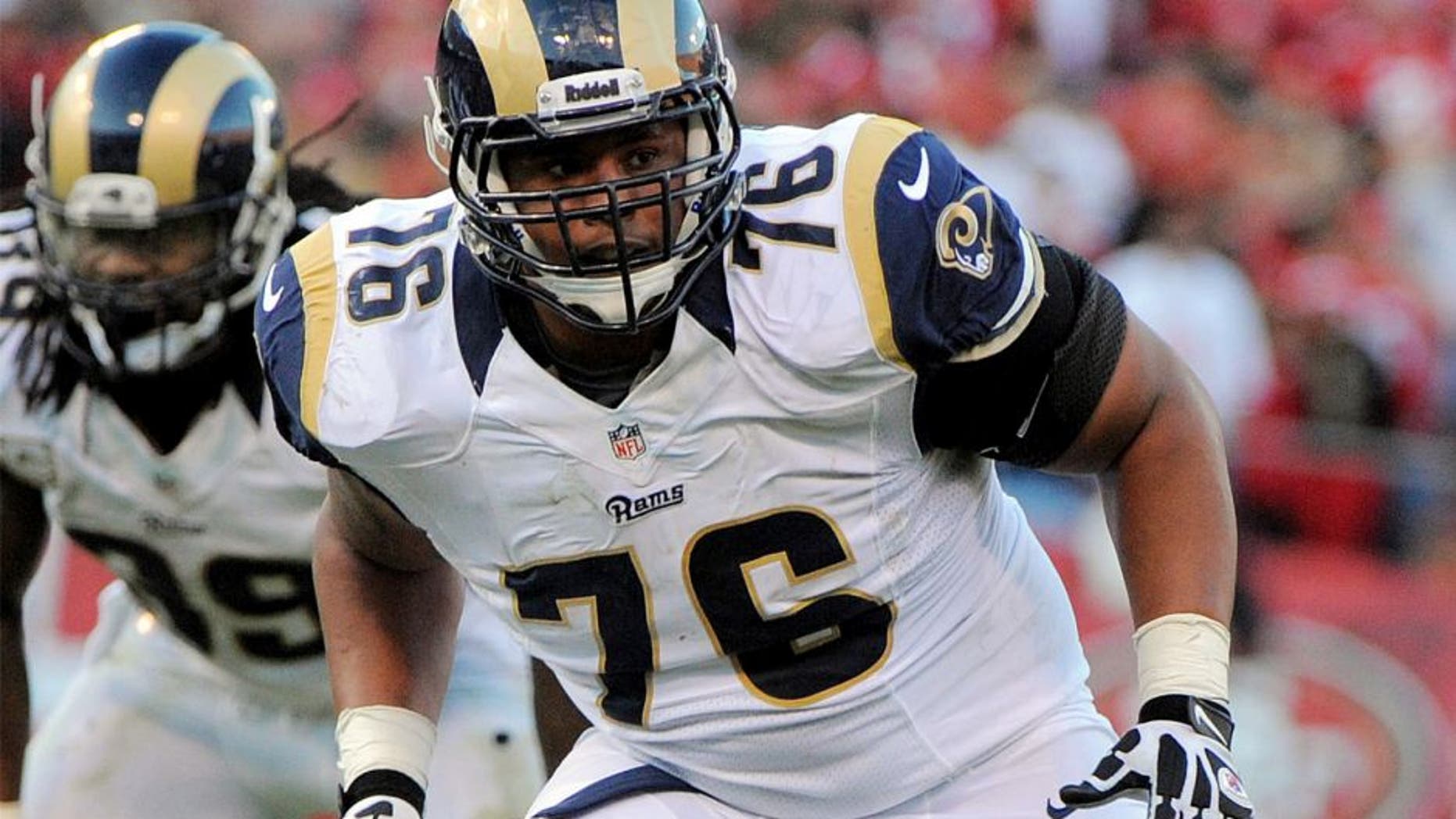 November 11, 2012; San Francisco, CA, USA; St. Louis Rams tackle Rodger Saffold (76) blocks a San Francisco 49ers outside linebacker during the fourth quarter at Candlestick Park. The 49ers and the Rams tied 24-24. Mandatory Credit: Kyle Terada-USA TODAY Sports