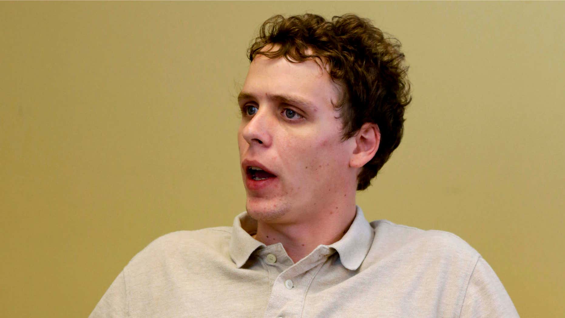 Aug. 7, 2014: Jon Daniel speaks at the American Civil Liberties Union of Illinois office in Chicago.
