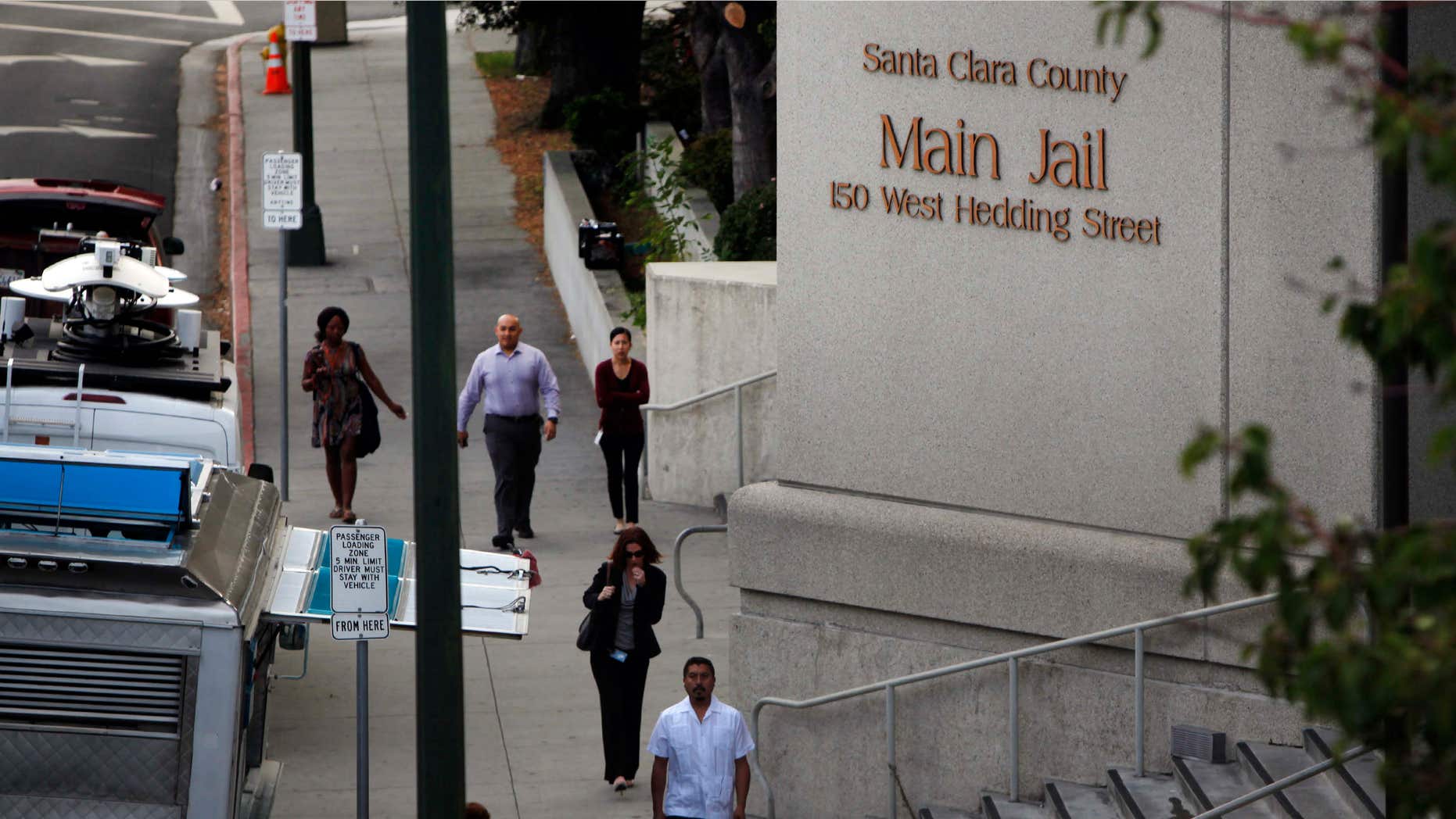 Sept. 2, 2015: Pedestrians walk past the Santa Clara County Jail in San Jose, Calif.