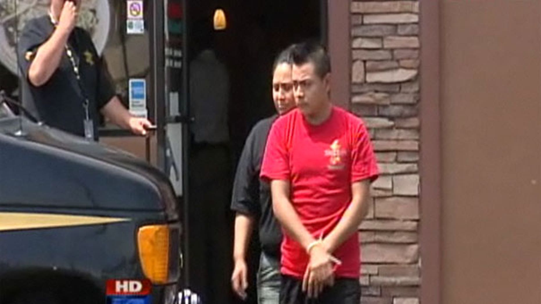 This screengrab shows footage from the Maricopa County Sheriffs Office workplace raid in Arizona.