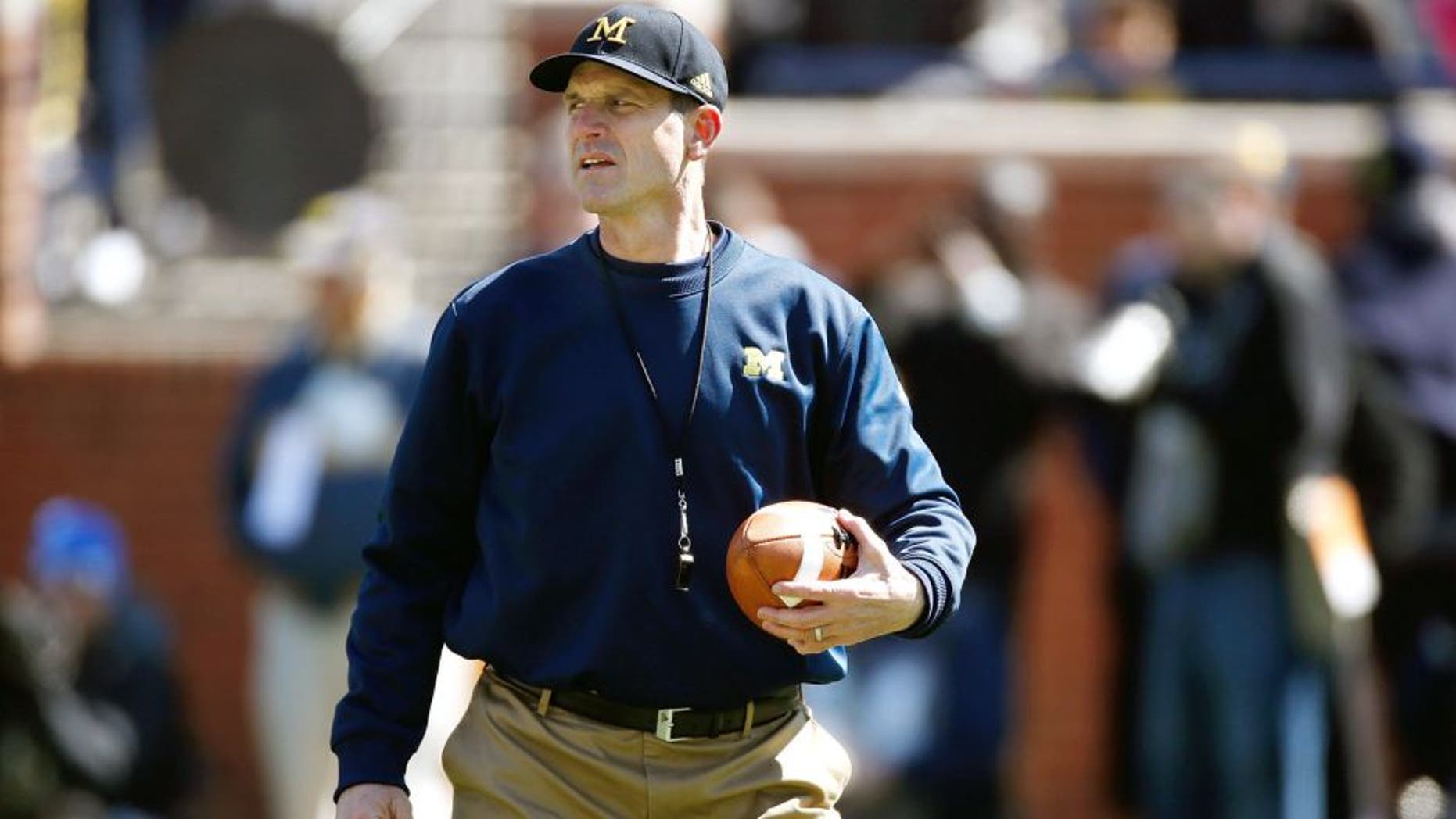 ANN ARBOR, MI - APRIL 04: Head coach Jim Harbaugh of the Michigan Wolverines looks on during the Michigan Football Spring Game on April 4, 2015 at Michigan Stadium in Ann Arbor, Michigan. (Photo by Gregory Shamus/Getty Images)