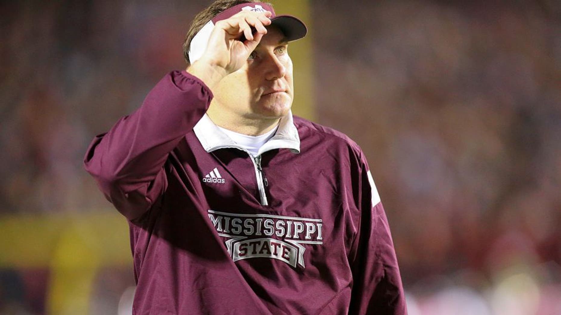 Nov 29, 2014; Oxford, MS, USA; Mississippi State Bulldogs head coach Dan Mullen looks on against the Mississippi Rebels at Vaught-Hemingway Stadium. The Rebels won 31-17. Mandatory Credit: Spruce Derden-USA TODAY Sports