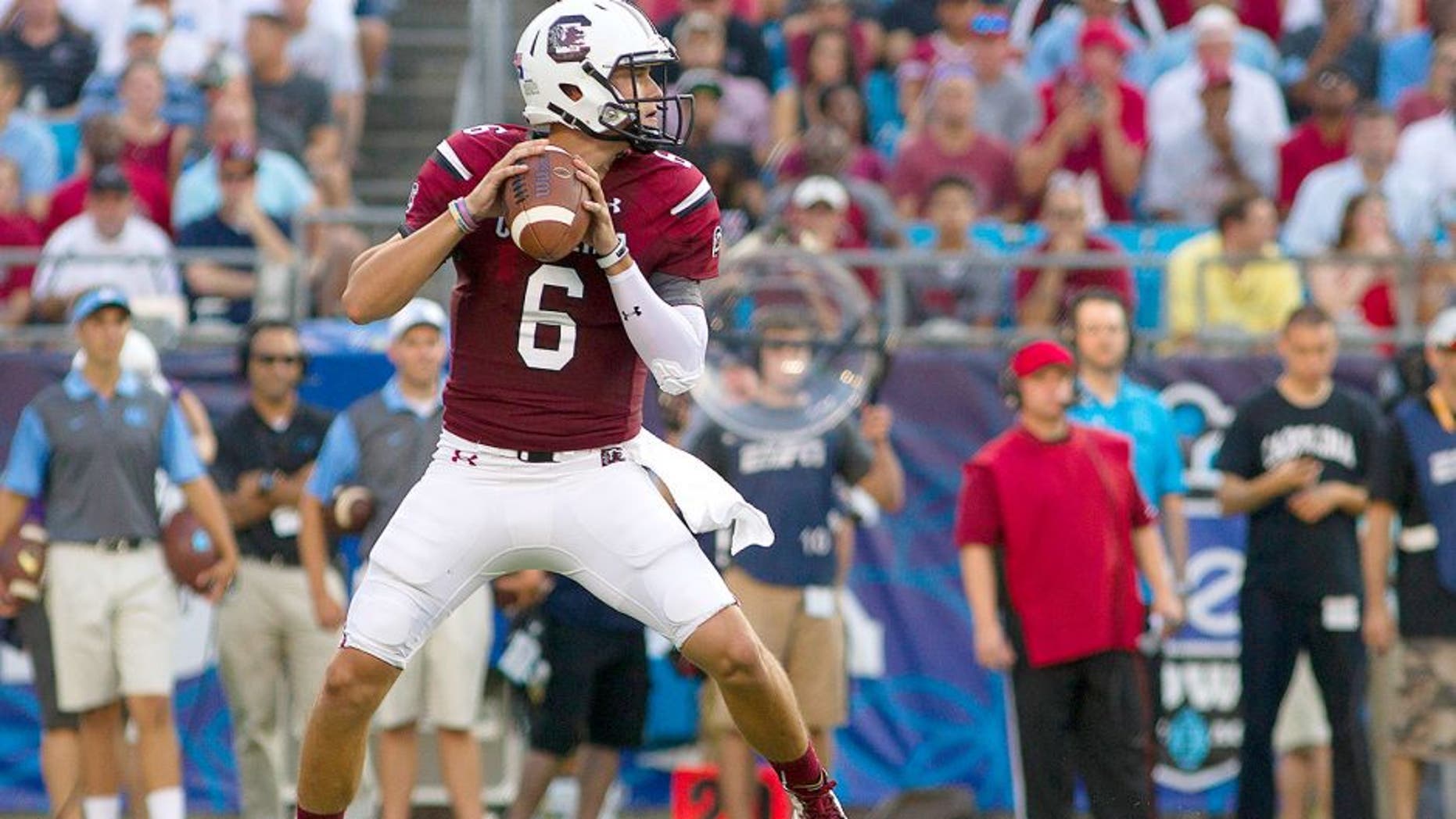 Sep 3, 2015; Charlotte, NC, USA; South Carolina Gamecocks quarterback Connor Mitch (6) looks to pass the ball during the second quarter against the North Carolina Tar Heels at Bank of America Stadium. Mandatory Credit: Joshua S. Kelly-USA TODAY Sports