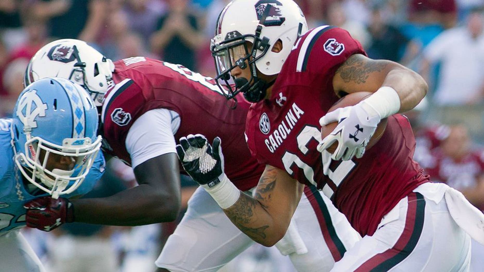 Sep 3, 2015; Charlotte, NC, USA; South Carolina Gamecocks running back Brandon Wilds (22) carries the ball during the first quarter against the North Carolina Tar Heels at Bank of America Stadium. Mandatory Credit: Joshua S. Kelly-USA TODAY Sports