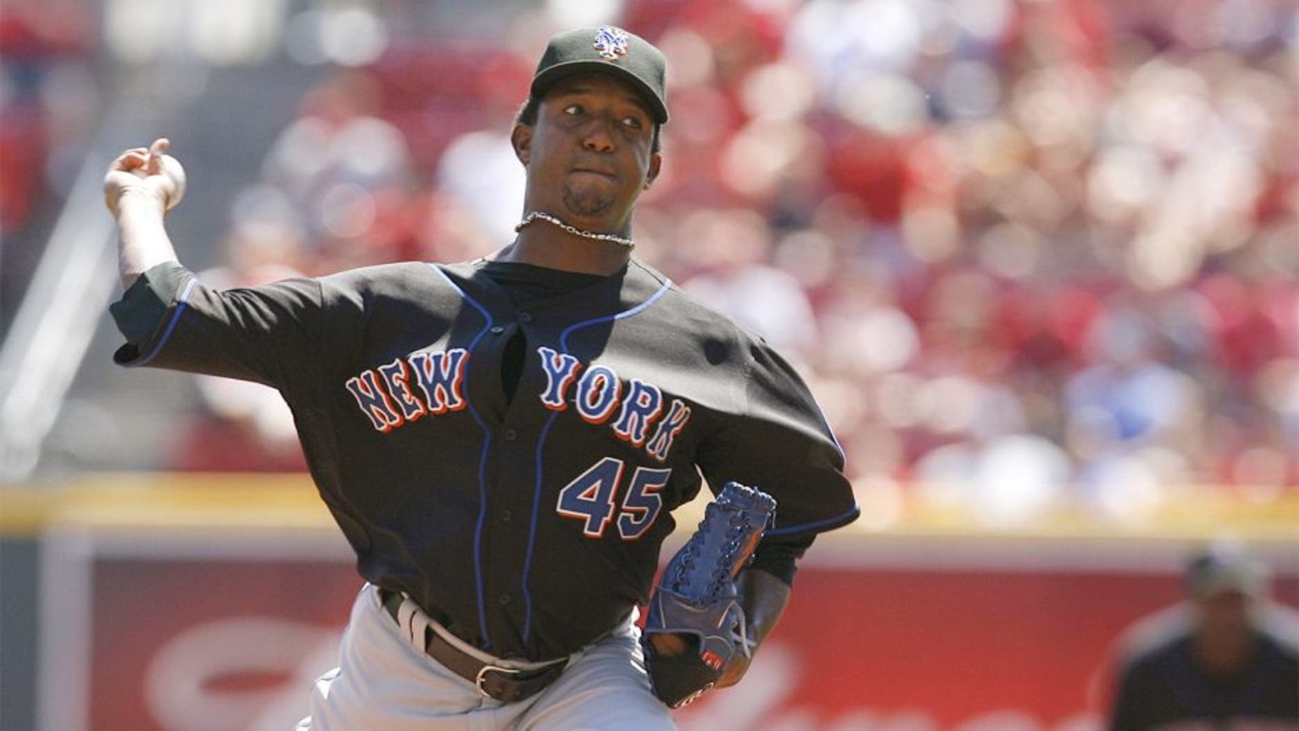 CINCINNATI - SEPTEMBER 3: Pitcher Pedro Martinez #45 of the New York Mets pitches against the Cincinnati Reds on September 3, 2007 at Great American Ball Park in Cincinnati, Ohio. Pedro Martinez recorded his 3000th strikeout during this game. (Photo by Thomas E. Witte/Getty Images)