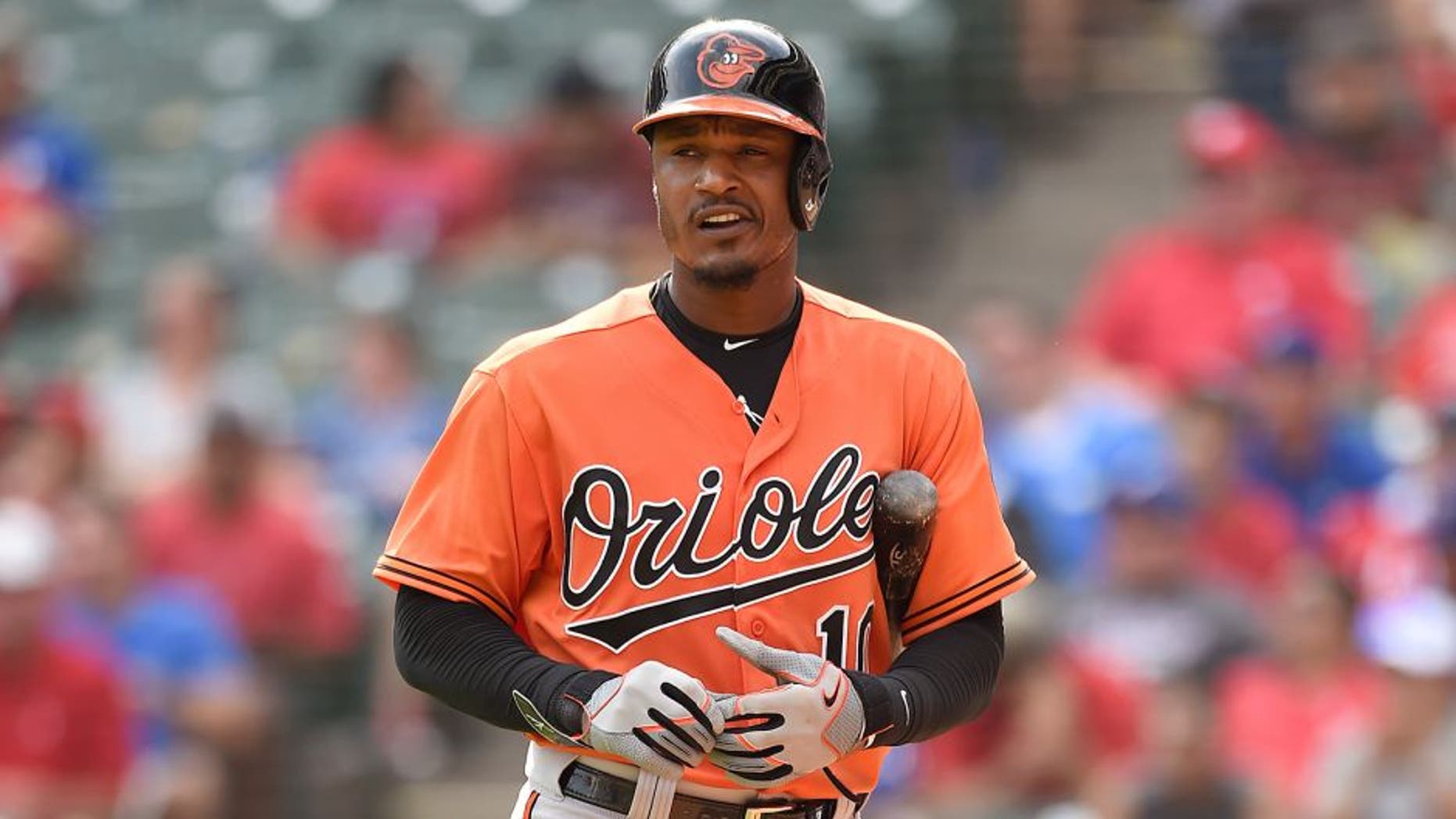 ARLINGTON, TX - AUGUST 30: Adam Jones #10 of the Baltimore Orioles looks off the field at the crowd as he walks back to the dugout after striking out in the game against the Texas Rangers at Globe Life Park in Arlington on August 30, 2015 in Arlington, Texas. The Texas Rangers defeated the Baltimore Orioles 6-0. (Photo by John Williamson/MLB Photos via Getty Images)
