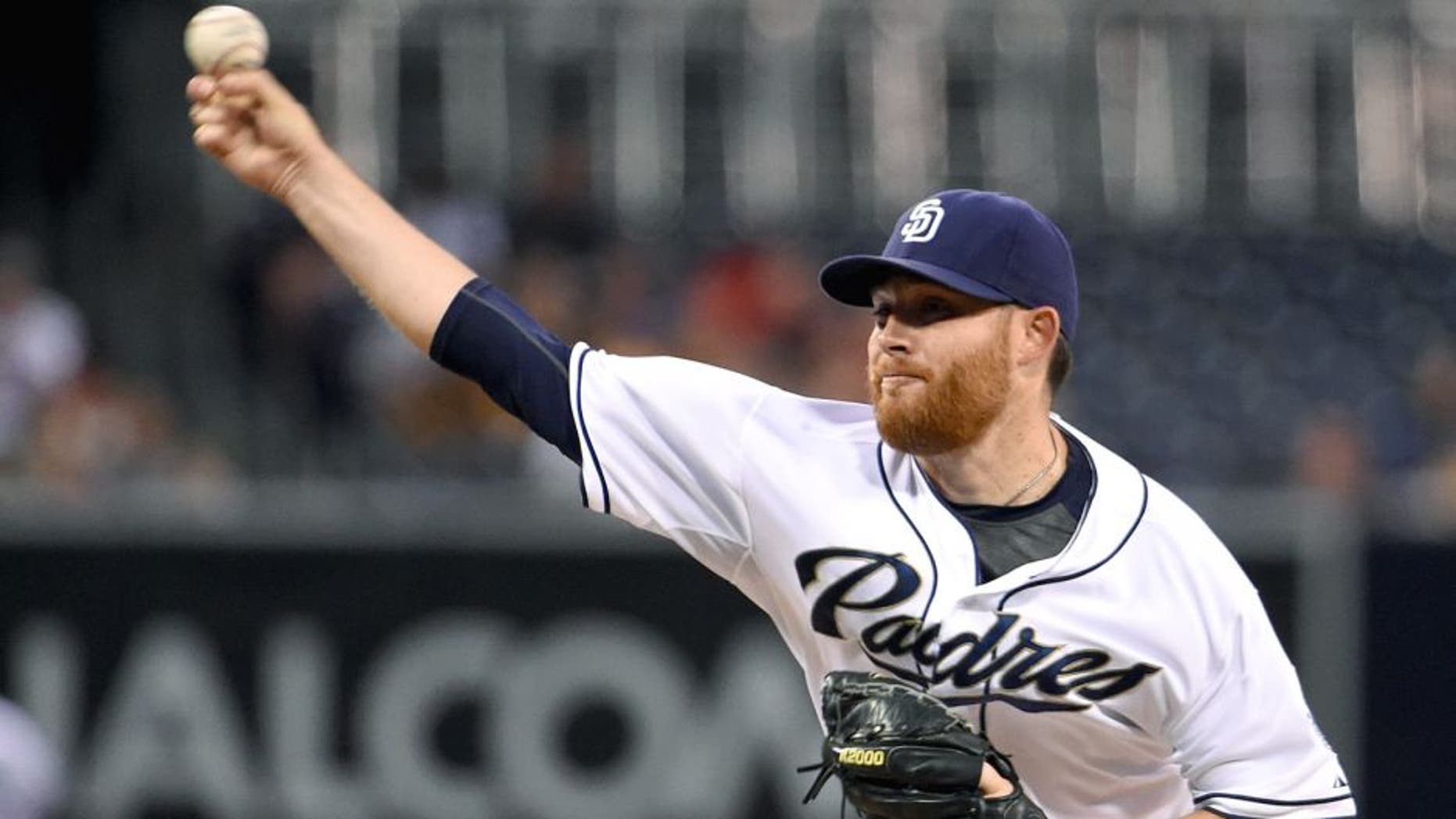 SAN DIEGO, CA - SEPTEMBER 2: Ian Kennedy #22 of the San Diego Padres pitches during the first inning of a baseball game against the Texas Rangers at Petco Park September, 2, 2015 in San Diego, California. (Photo by Denis Poroy/Getty Images)
