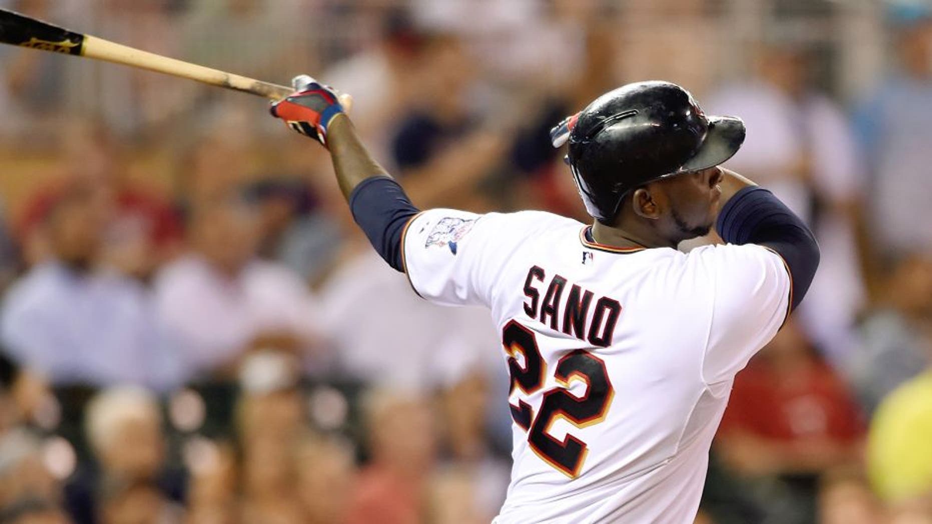 MINNEAPOLIS, MN - SEPTEMBER 1: Miguel Sano #22 of the Minnesota Twins hits a solo home run against the Chicago White Sox during the seventh inning of the game on September 1, 2015 at Target Field in Minneapolis, Minnesota. The Twins defeated the White Sox 8-6. (Photo by Hannah Foslien/Getty Images)