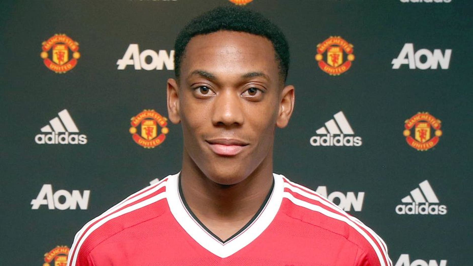 MANCHESTER, ENGLAND - SEPTEMBER 01: (EXCLUSIVE COVERAGE) (MINIMUM FEES APPLY - 150 GBP PRINT AND ON AIR & 75 GBP ONLINE OR LOCAL EQUIVALENT, PER IMAGE) Manchester United unveil new signing Anthony Martial at Aon Training Complex on September 1, 2015 in Manchester, England. (Photo by John Peters/Man Utd via Getty Images)