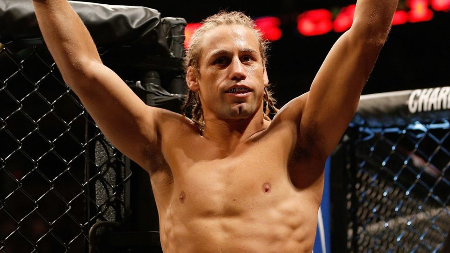 BOSTON, MA - AUGUST 17: Urijah Faber enters the Octagon before his UFC bantamweight bout against Iuri Alcantara at TD Garden on August 17, 2013 in Boston, Massachusetts. (Photo by Josh Hedges/Zuffa LLC/Zuffa LLC via Getty Images)
