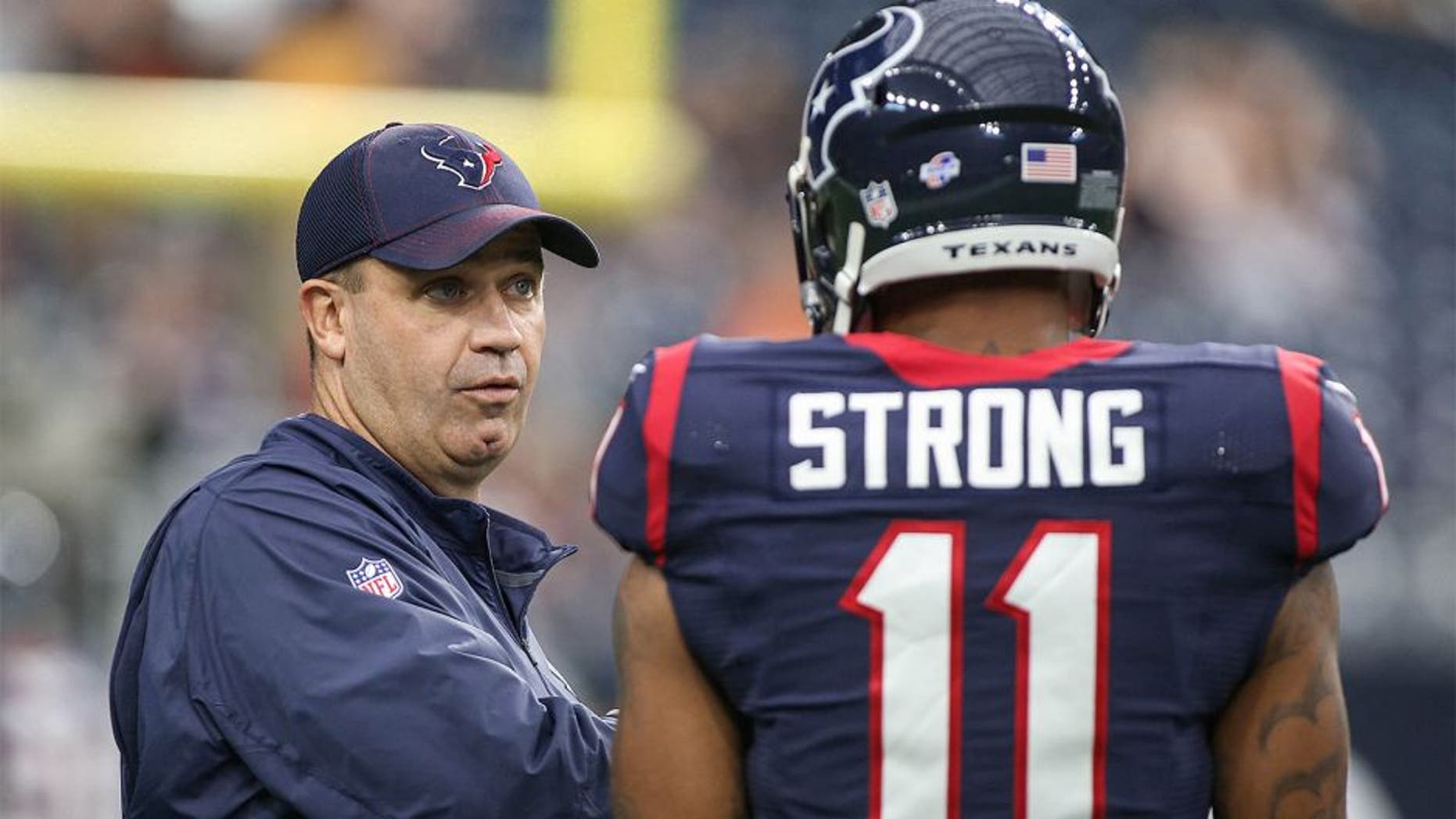 Aug 22, 2015; Houston, TX, USA; Houston Texans head coach Bill O'Brien talks with wide receiver Jaelen Strong (11) before a game against the Denver Broncos at NRG Stadium. Mandatory Credit: Troy Taormina-USA TODAY Sports