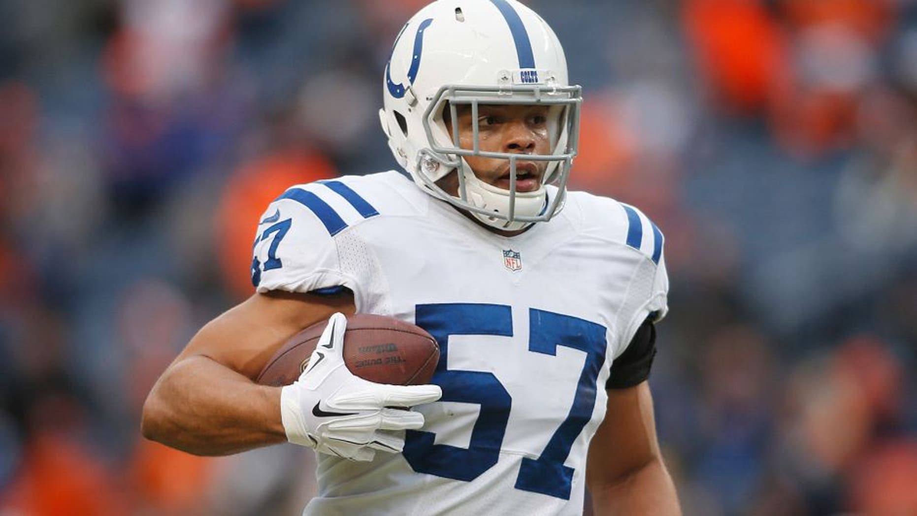 Jan 11, 2015; Denver, CO, USA; Indianapolis Colts outside linebacker Josh McNary (57) in the 2014 AFC Divisional playoff football game against the Denver Broncos at Sports Authority Field at Mile High. Mandatory Credit: Chris Humphreys-USA TODAY Sports