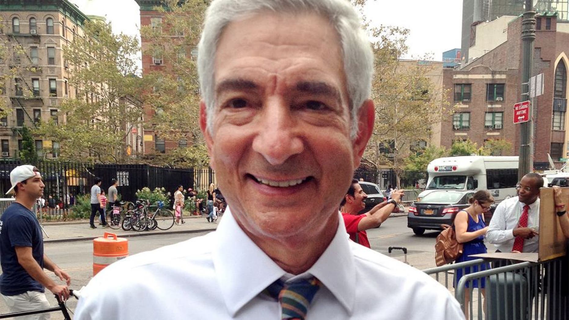 FILE - In this Aug. 31, 2015, file photo, Judge Richard M. Berman enters federal court in New York. A federal judge deflated "Deflategate" Thursday, Sept. 3, 2015, erasing New England quarterback Tom Brady's four-game suspension for a controversy that the NFL claimed threatened football's integrity. U.S. District Judge Richard M. Berman said NFL Commissioner Roger Goodell went too far in affirming punishment of the Super Bowl winning quarterback. (AP Photo/Larry Neumeister, File)