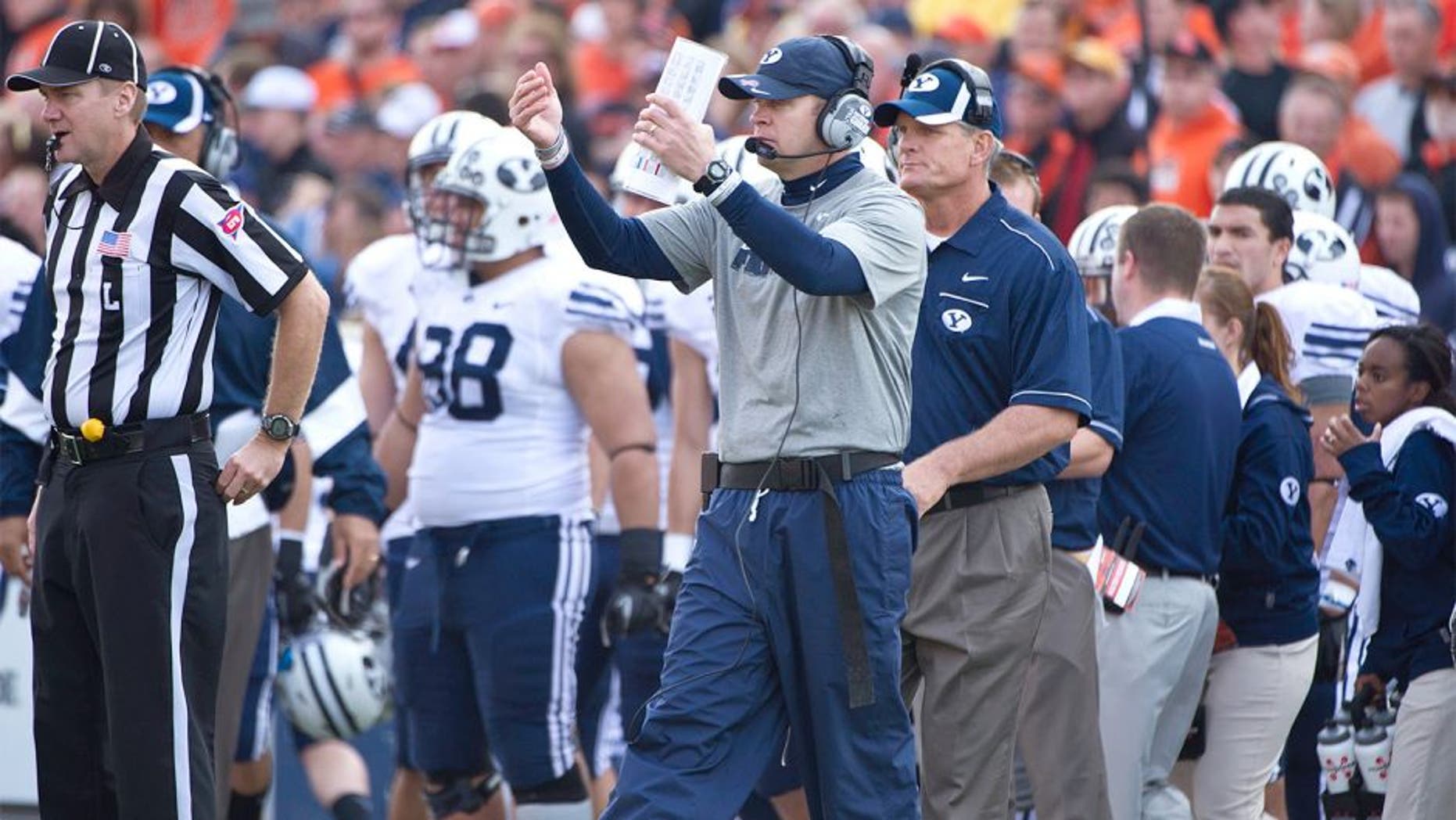 Oct 15, 2011; Corvallis, OR, USA; Brigham Young Cougars head coach Bronco Mendenhall calls his team over during the second half against the Oregon State Beavers at Reser Stadium. Mandatory Credit: Jim Z. Rider-USA TODAY Sports.