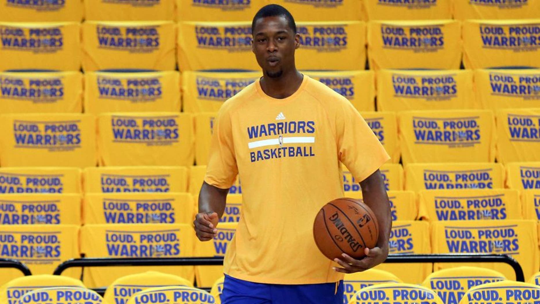 Apr 24, 2014; Oakland, CA, USA; Golden State Warriors forward Harrison Barnes (40) warms up before game three of the first round of the 2014 NBA Playoffs against the Los Angeles Clippers at Oracle Arena. Mandatory Credit: Kelley L Cox-USA TODAY Sports