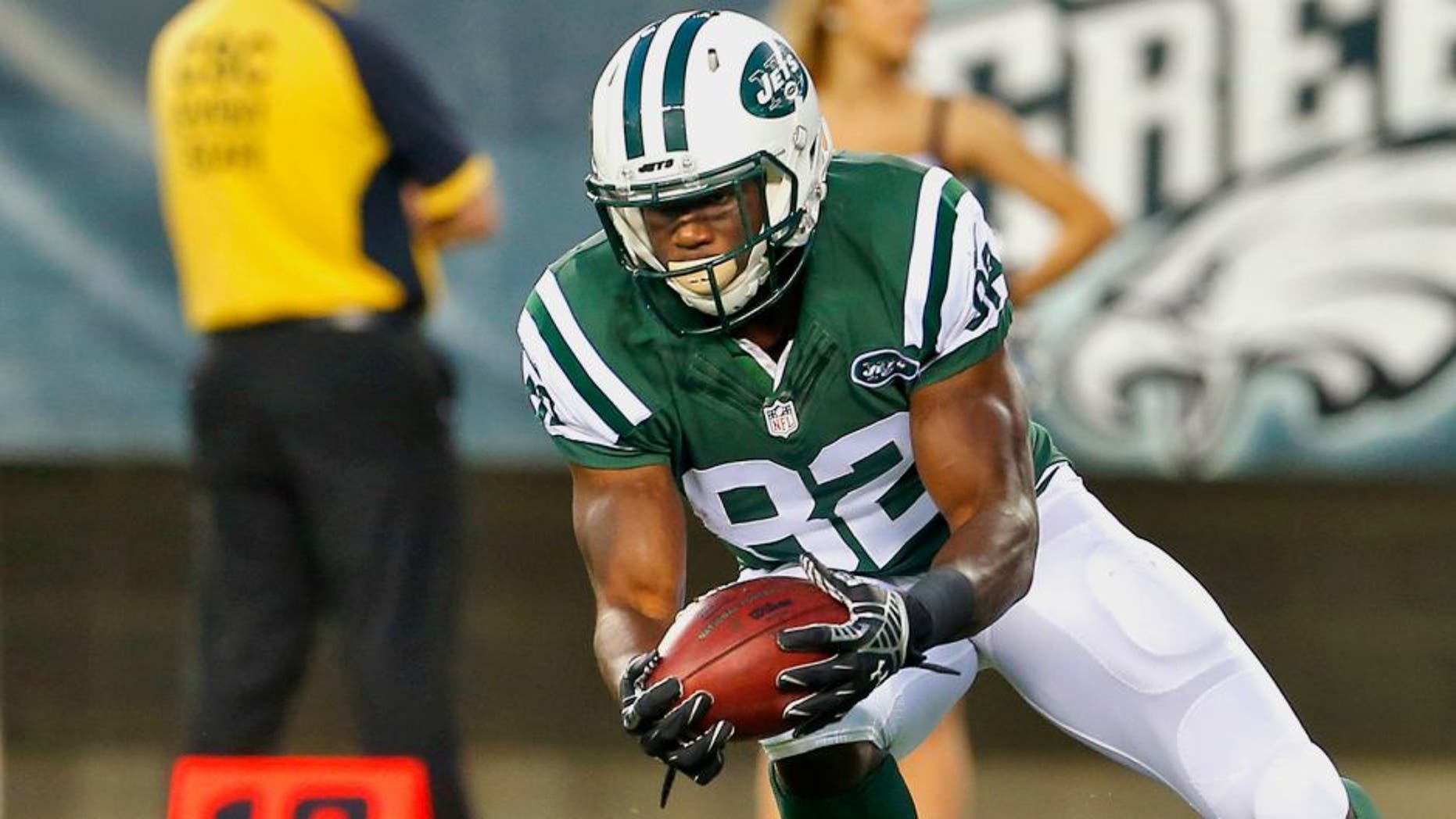 PHILADELPHIA, PA - AUGUST 28: Quincy Enunwa #82 of the New York Jets downs the ball on a punt on the sis years line during a preseason football game against the Philadelphia Eagles at Lincoln Financial Field on August 28, 2014 in Philadelphia, Pennsylvania. (Photo by Rich Schultz /Getty Images)