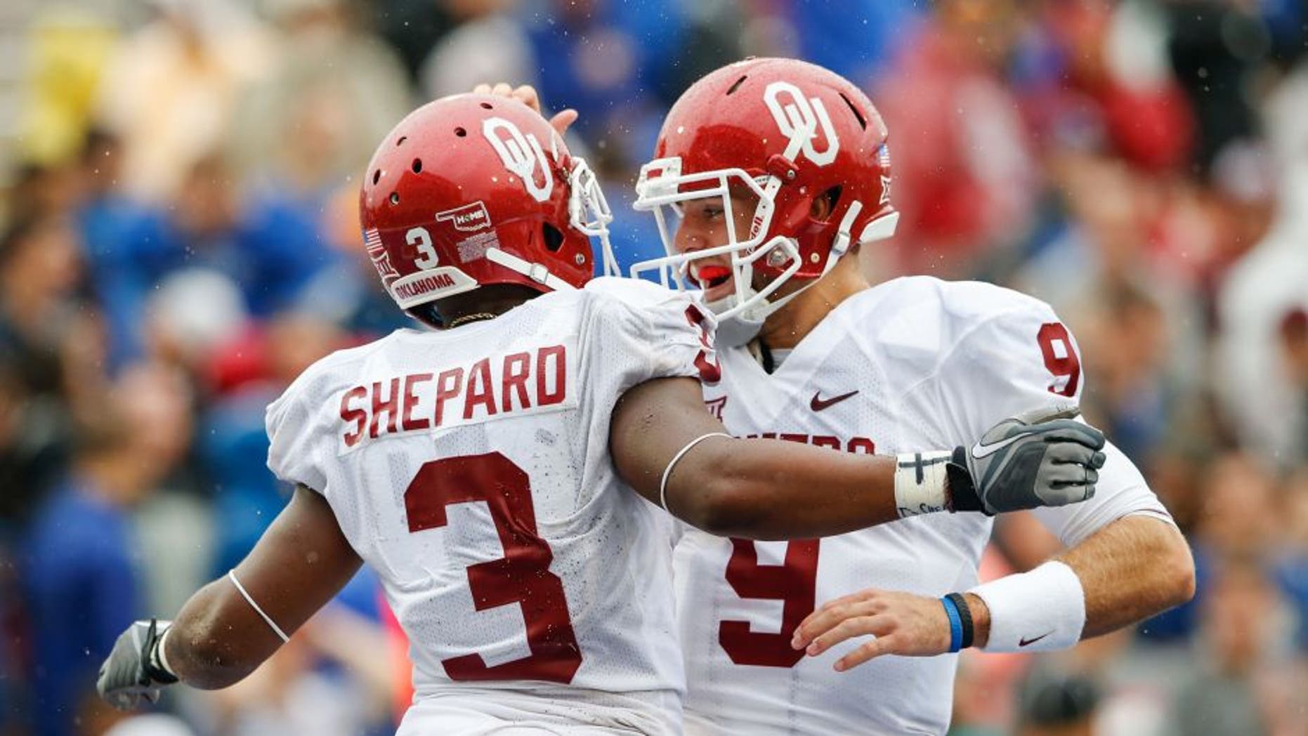 Sep 6, 2014; Tulsa, OK, USA; Oklahoma Sooners wide receiver Sterling Shepard (3) celebrates scoring a touchdown with quarterback Trevor Knight (9) during the second half against the Tulsa Golden Hurricane at Skelly Field at H.A. Chapman Stadium. Mandatory Credit: Kevin Jairaj-USA TODAY Sports