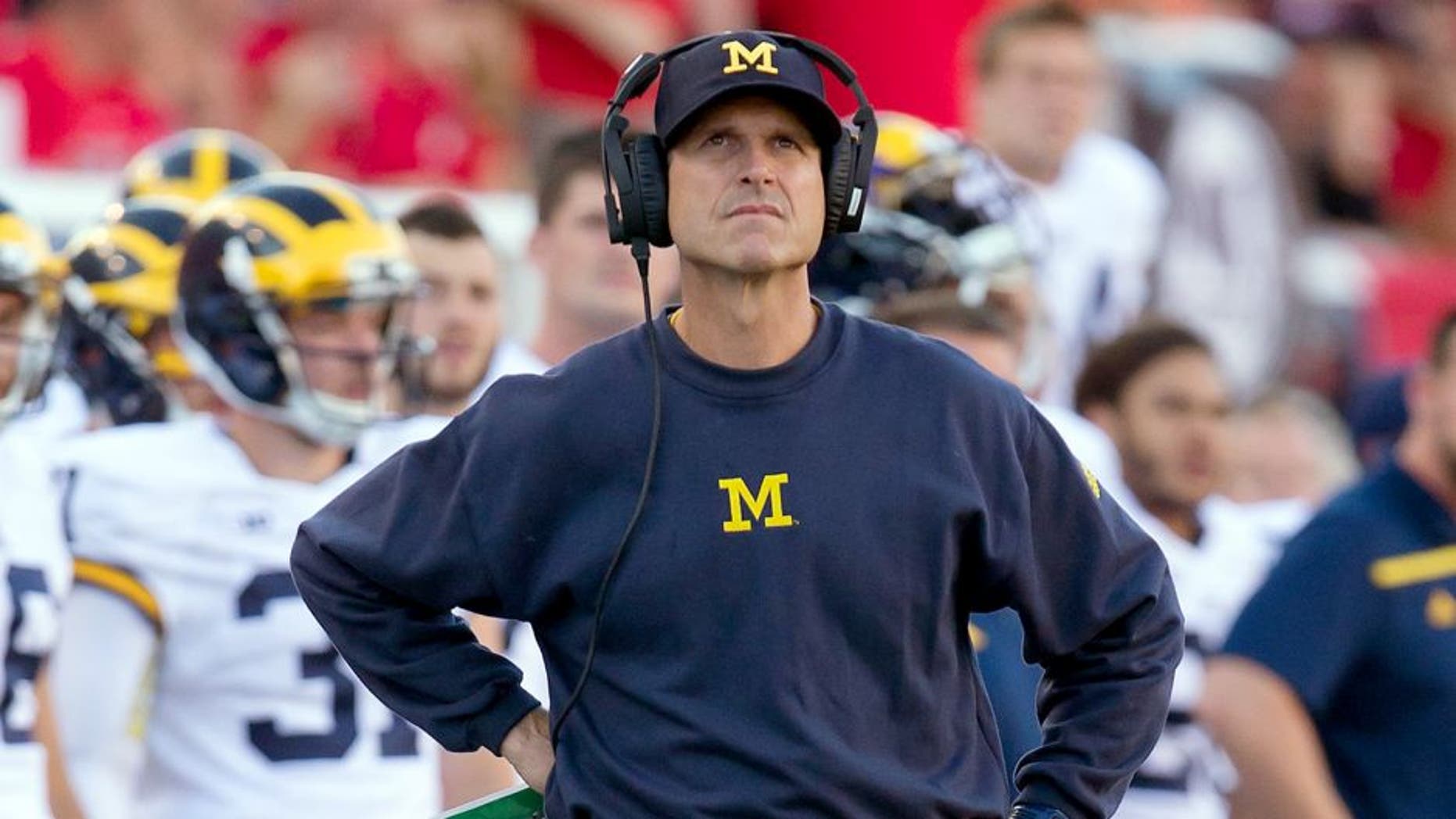 Sep 3, 2015; Salt Lake City, UT, USA; Michigan Wolverines head coach Jim Harbaugh during the first quarter against the Utah Utes at Rice-Eccles Stadium. Mandatory Credit: Russ Isabella-USA TODAY Sports