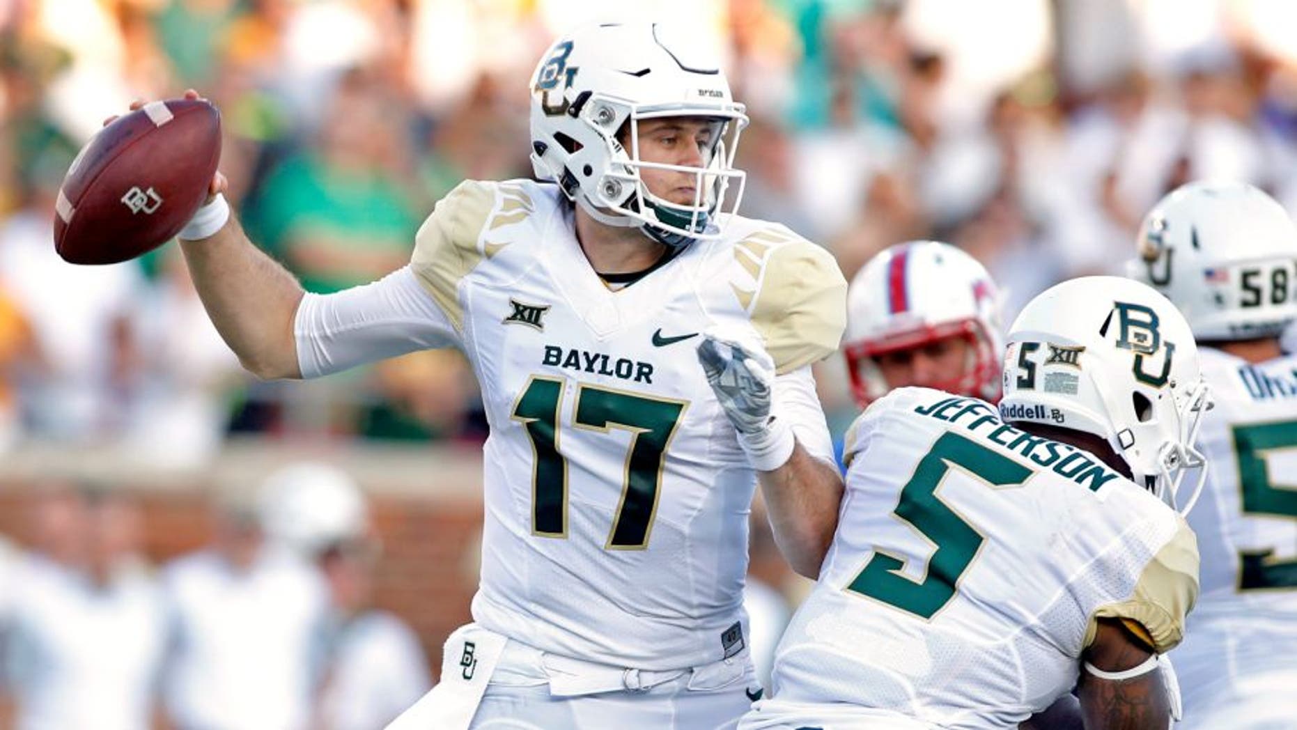 Sep 4, 2015; Dallas, TX, USA; Baylor Bears quarterback Seth Russell (17) throws a pass in the first quarter against the Southern Methodist Mustangs at Gerald J. Ford Stadium. Mandatory Credit: Tim Heitman-USA TODAY Sports