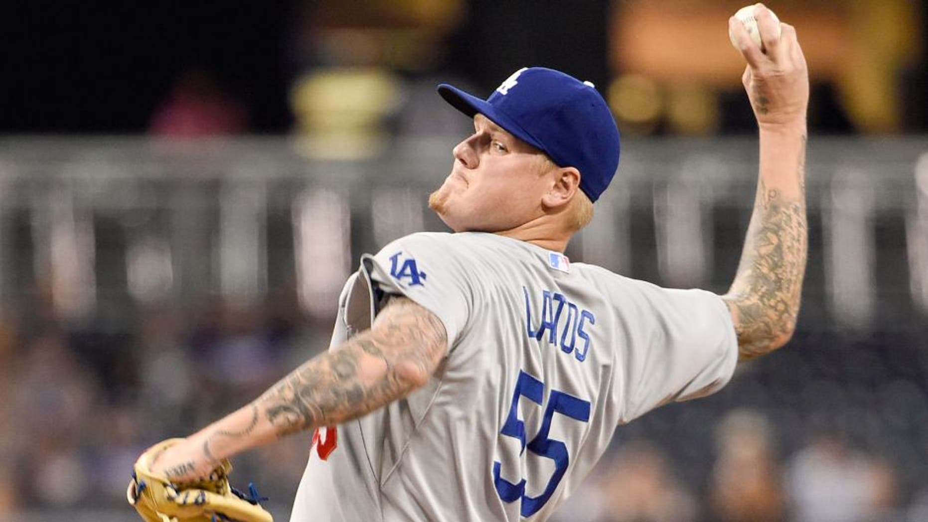 SAN DIEGO, CA - SEPTEMBER 3: Mat Latos #55 of the Los Angeles Dodgers pitches during the first inning of a baseball game against the San Diego Padres at Petco Park September, 3, 2015 in San Diego, California. (Photo by Denis Poroy/Getty Images)