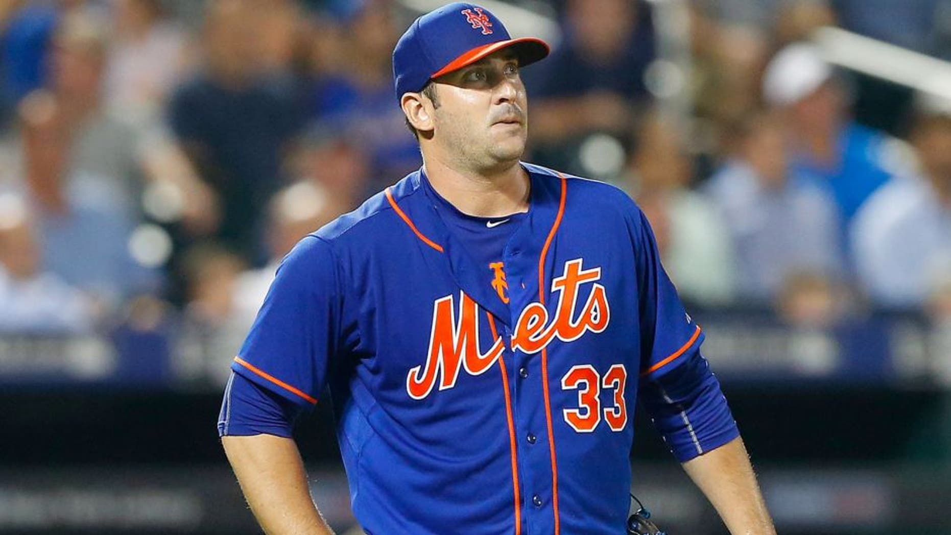 NEW YORK, NY - SEPTEMBER 02: Matt Harvey #33 of the New York Mets in action against the Philadelphia Phillies at Citi Field on September 2, 2015 in the Flushing neighborhood of the Queens borough of New York City. The Mets defeated the Phillies 9-4. (Photo by Jim McIsaac/Getty Images)