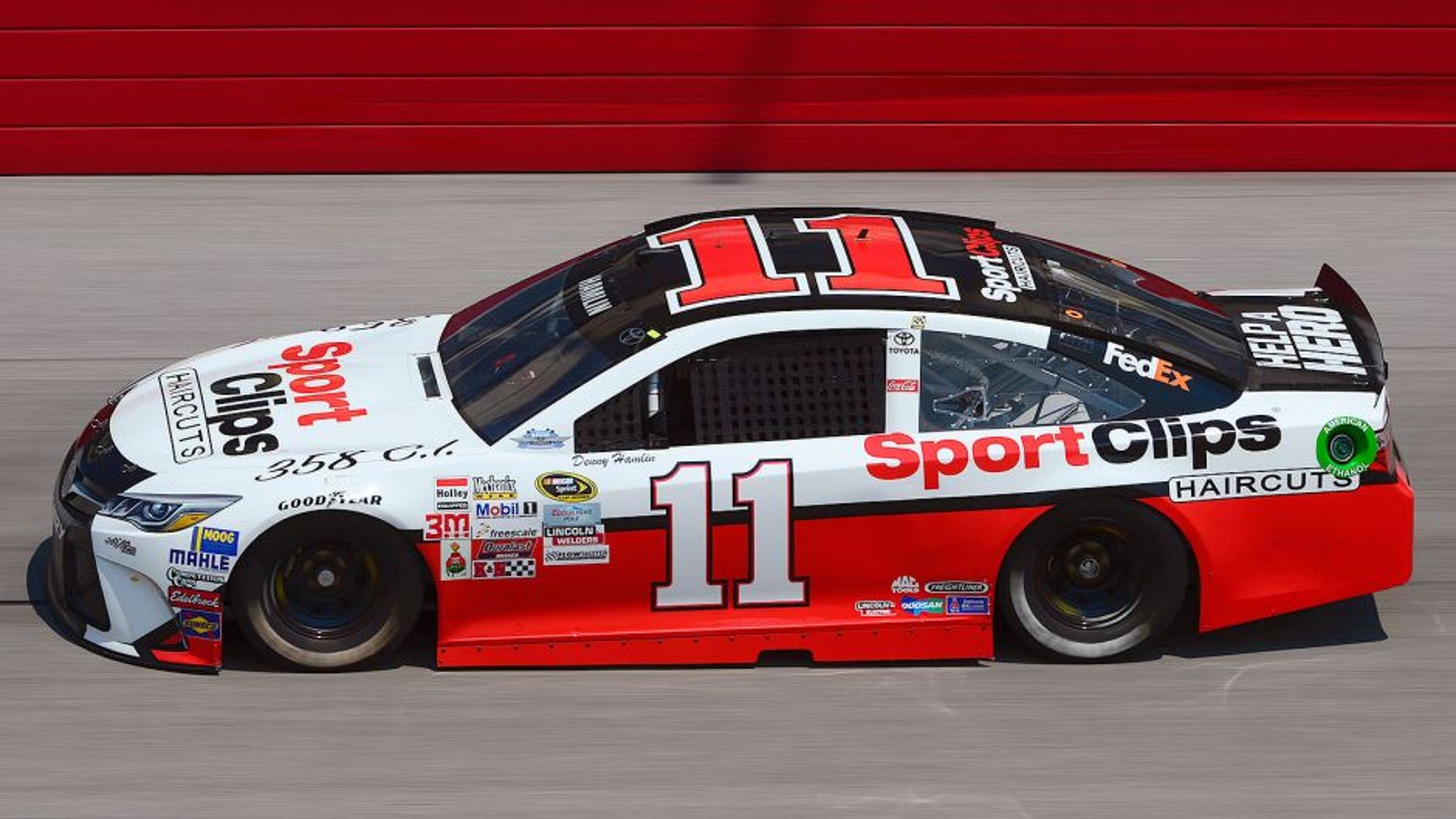 DARLINGTON, SC - SEPTEMBER 04: Denny Hamlin, driver of the #11 Sport Clips Toyota, practices for the NASCAR Sprint Cup Series Bojangles' Southern 500 at Darlington Raceway on September 4, 2015 in Darlington, South Carolina. (Photo by Robert Laberge/NASCAR via Getty Images)