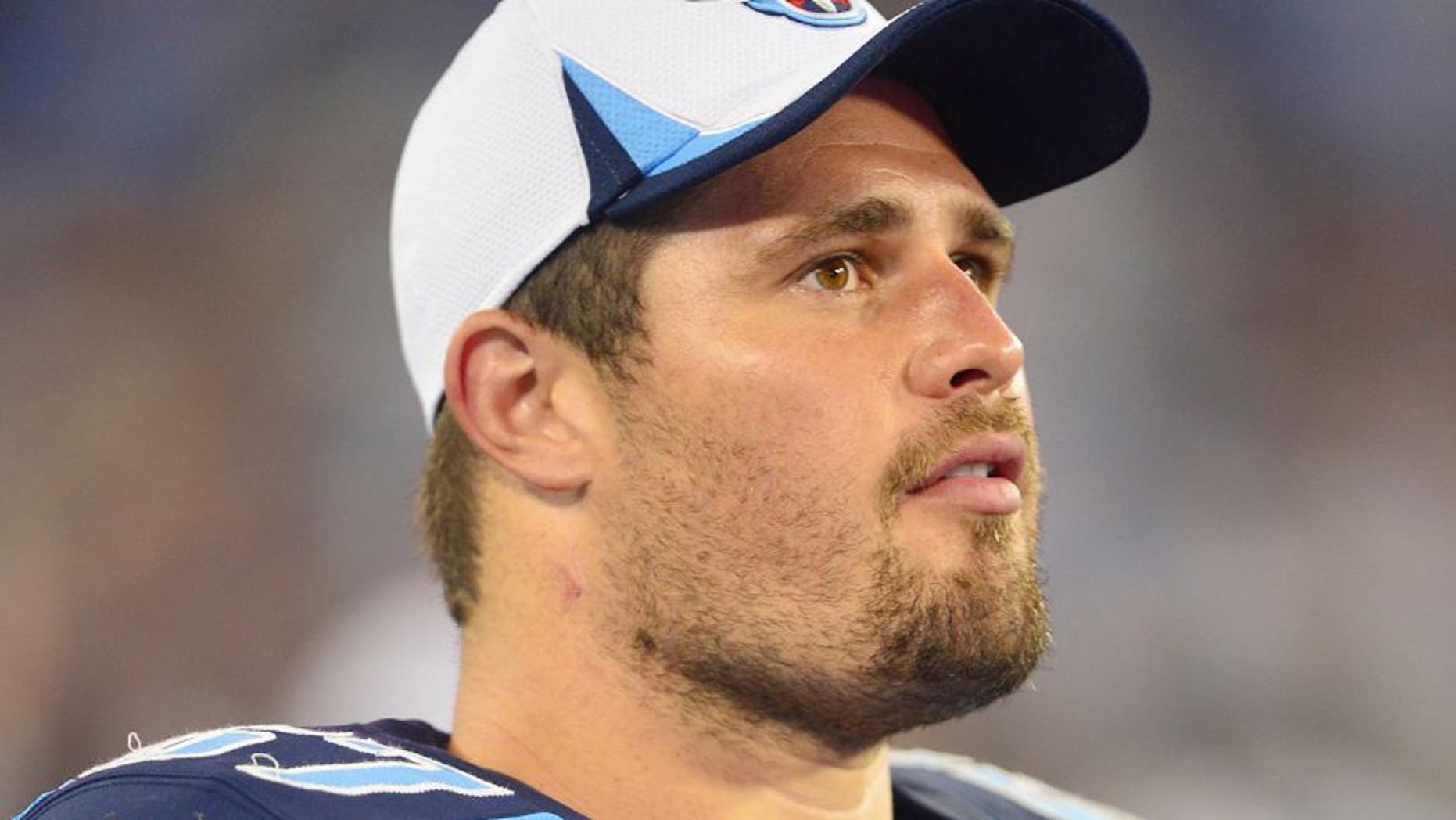 Aug 8, 2013; Nashville, TN, USA; Tennessee Titans guard Andy Levitre (67) watches his team play against the Washington Redskins during the second half at LP Field. The Redskins beat the Titans 22-21. Mandatory Credit: Don McPeak-USA TODAY Sports