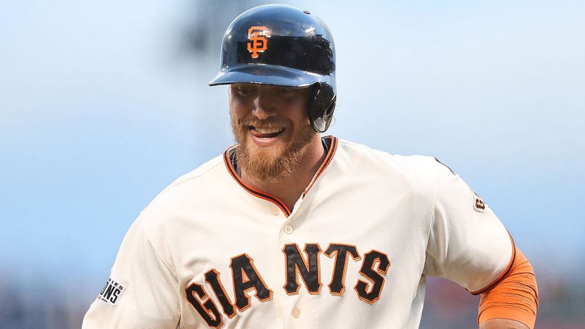 SAN FRANCISCO, CA - MAY 19: Hunter Pence #8 of the San Francisco Giants heads back to the dugout after striking out in the bottom of the second inning against the Los Angeles Dodgers at AT&T Park on May 19, 2015 in San Francisco, California. The Giants swept the NL West leaders during the last homestand in San Francisco. (Photo by Don Feria/Getty Images)