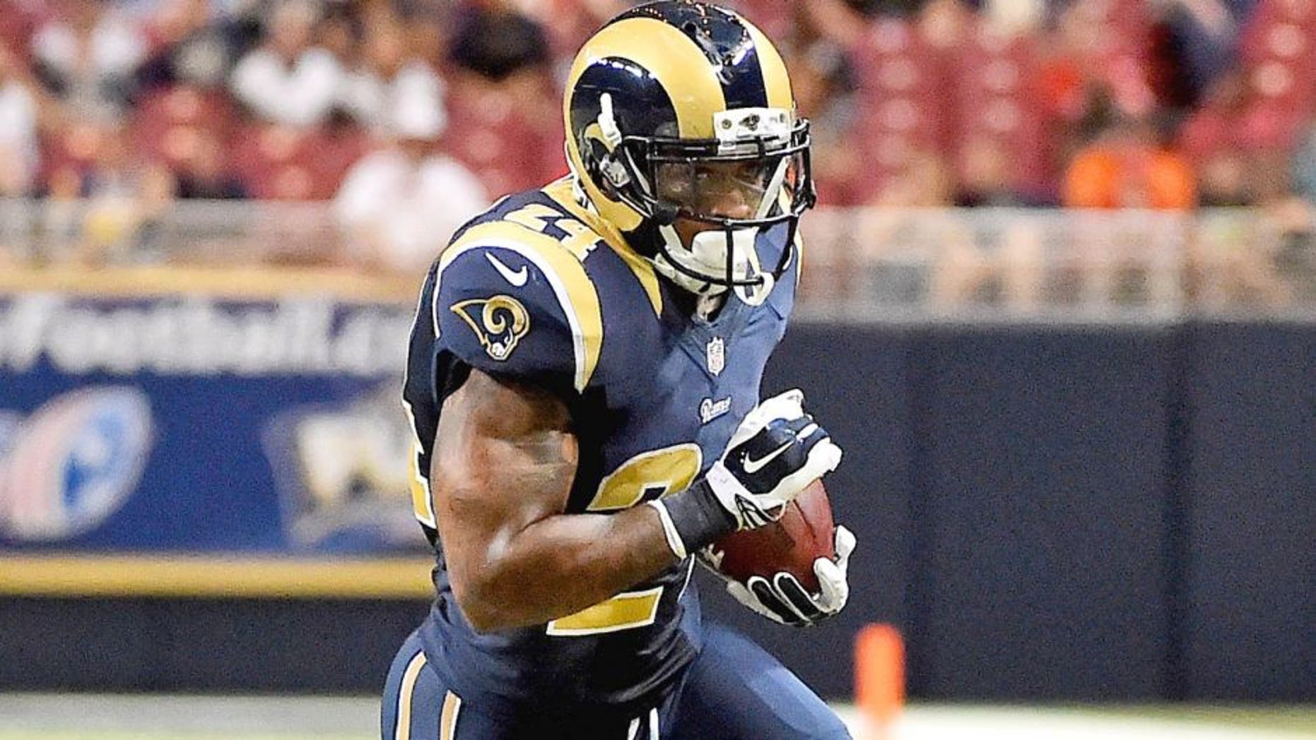 Sep 3, 2015; St. Louis, MO, USA; St. Louis Rams running back Isaiah Pead (24) runs the ball against the Kansas City Chiefs during the first half at the Edward Jones Dome. Mandatory Credit: Jasen Vinlove-USA TODAY Sports