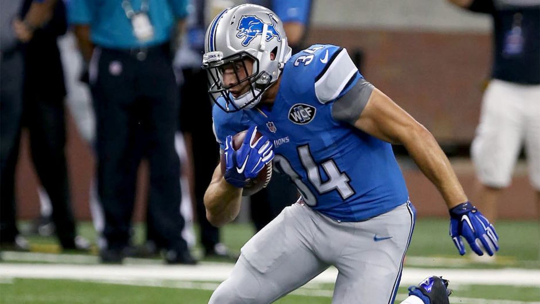 DETROIT, MI - AUGUST 13: Running Back Zach Zenner #34 of the Detroit Lions has a long gain against the New York Jets at Ford Field on August 13, 2015 in Detroit, Michigan. (Photo by Al Pereira/Getty Images for New York Jets)