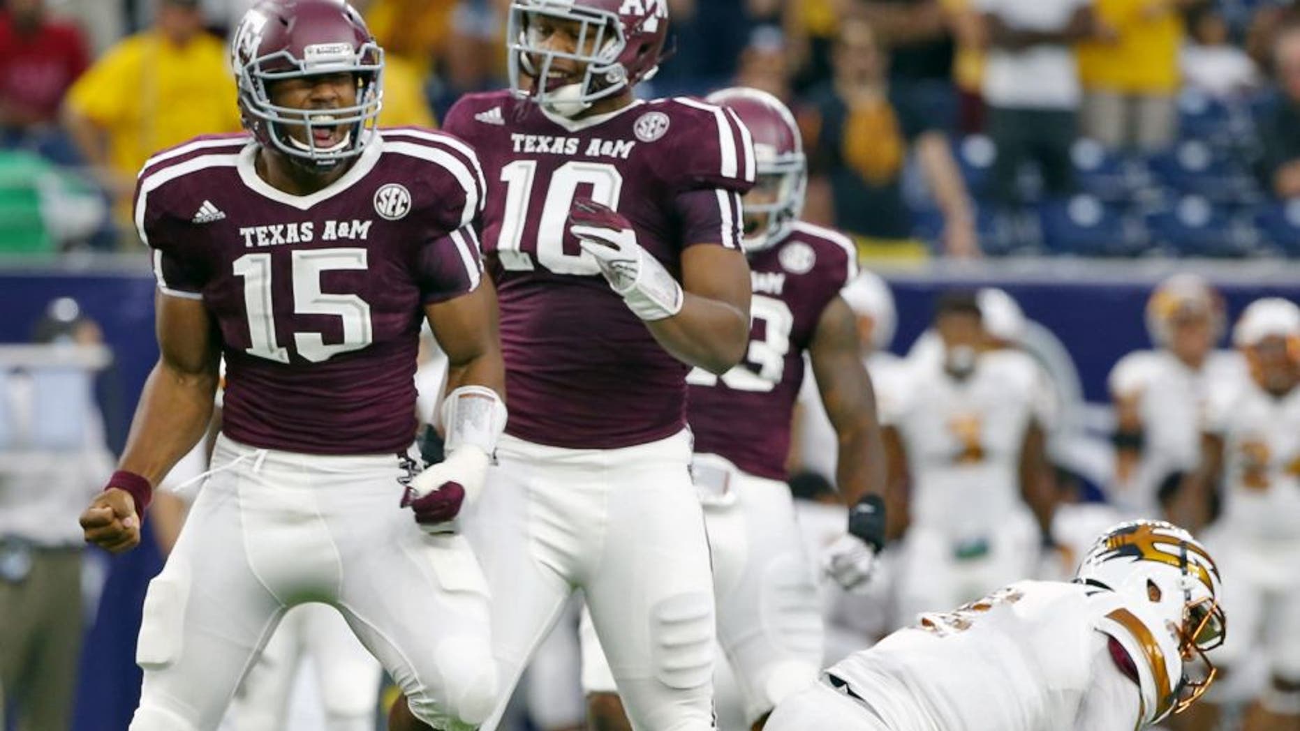 HOUSTON, TX - SEPTEMBER 05: Myles Garrett #15 of the Texas A&M Aggies celebrates after his sack of Mike Bercovici #2 of the Arizona State Sun Devils during the first half of their game during the Advocare Texas Kickoff at NRG Stadium on September 5, 2015 in Houston, Texas. (Photo by Scott Halleran/Getty Images)