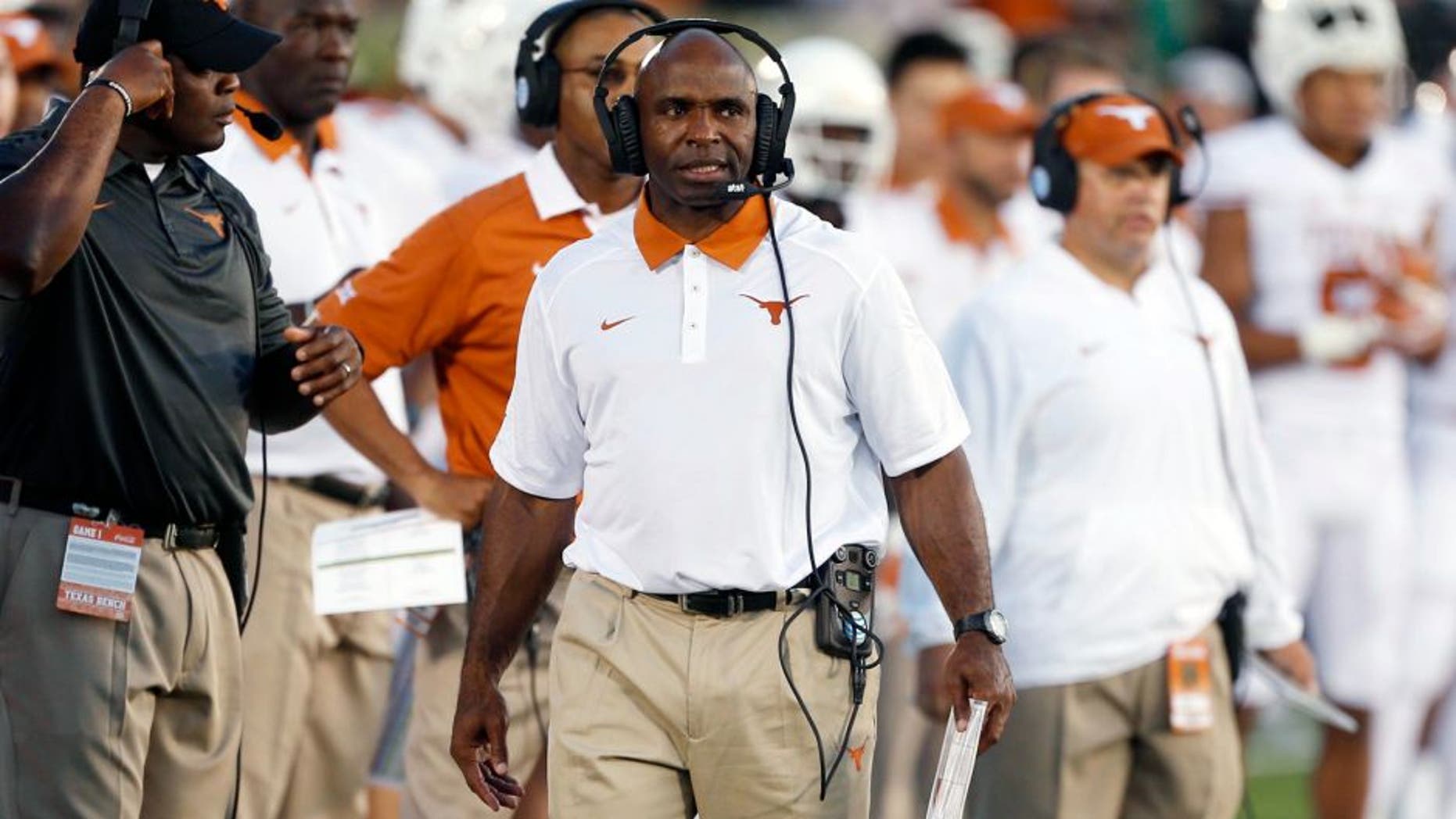 Sep 5, 2015; South Bend, IN, USA; Texas Longhorns coach Charlie Strong coaches on the sidelines against the Notre Dame Fighting Irish at Notre Dame Stadium. Mandatory Credit: Brian Spurlock-USA TODAY Sports