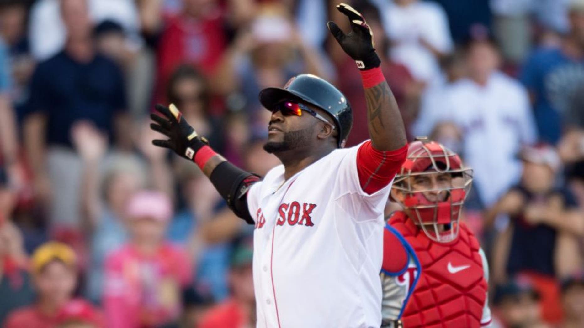 BOSTON, MA - SEPTEMBER 5: David Ortiz #34 of the Boston Red Sox reacts after hitting a home run during the fourth inning against the Philadelphia Phillies at Fenway Park on September 5, 2015 in Boston, Massachusetts. It was career home run number 496 for Ortiz. (Photo by Michael Ivins/Boston Red Sox/Getty Images)