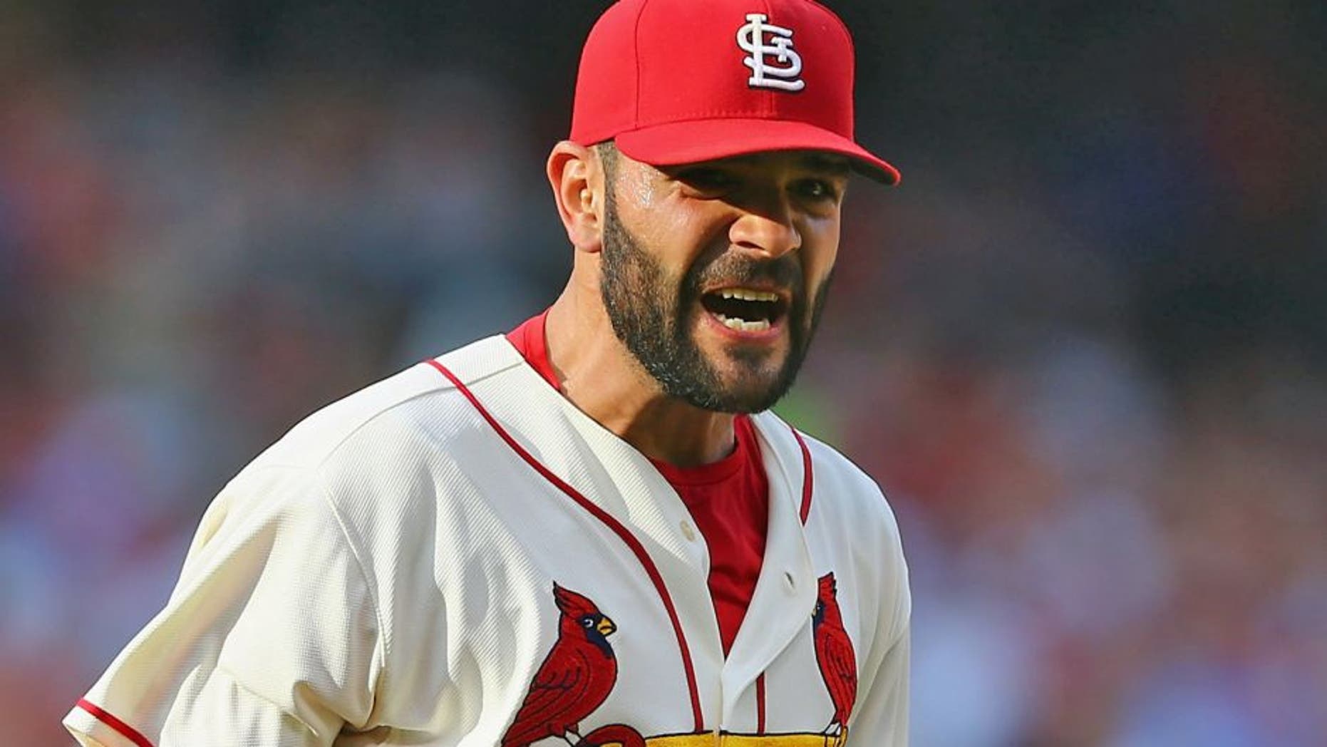 ST. LOUIS, MO - SEPTEMBER 5: Starter Jaime Garcia #54 of the St. Louis Cardinals celebrates after getting out of the in the seventh inning without allowing the Pittsburgh Pirates to score a run at Busch Stadium on September 5, 2015 in St. Louis, Missouri. (Photo by Dilip Vishwanat/Getty Images)