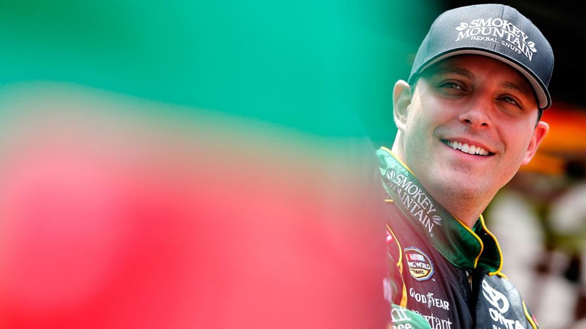 BRISTOL, TN - AUGUST 18: Johnny Sauter, driver of the #98 Smokey Mtn/Curb Records Toyota, stands in the garage during practice for the NASCAR Camping World Truck Series UNOH 200 race at Bristol Motor Speedway on August 18, 2015 in Bristol, Tennessee. (Photo by Brian Lawdermilk/NASCAR via Getty Images)