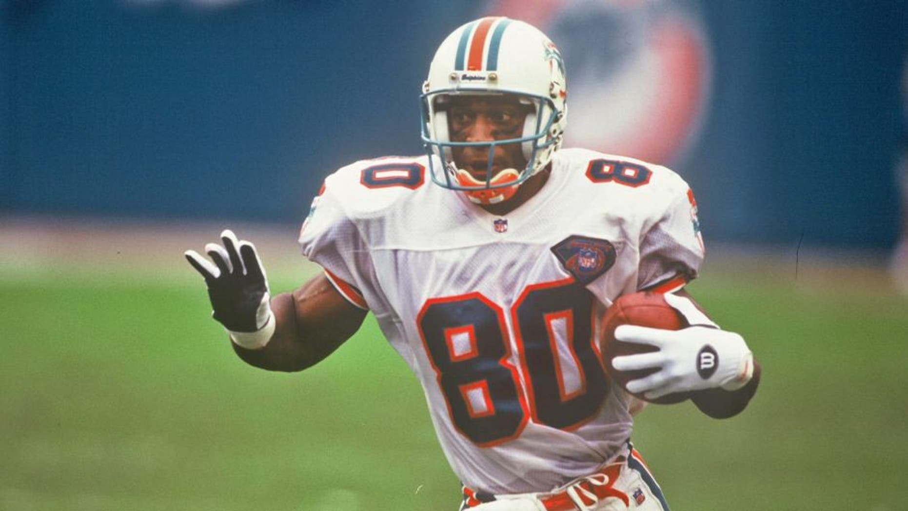 MIAMI - NOVEMBER 13: Irving Fryar #80 of the Miami Dolphins runs after a catch during a game against the Chicago Bears at Joe Robbie Stadium on November 13, 1994 in Miami, Florida. Chicago won 17-14. (Photo by Rogers Photo Archive/Getty Images)