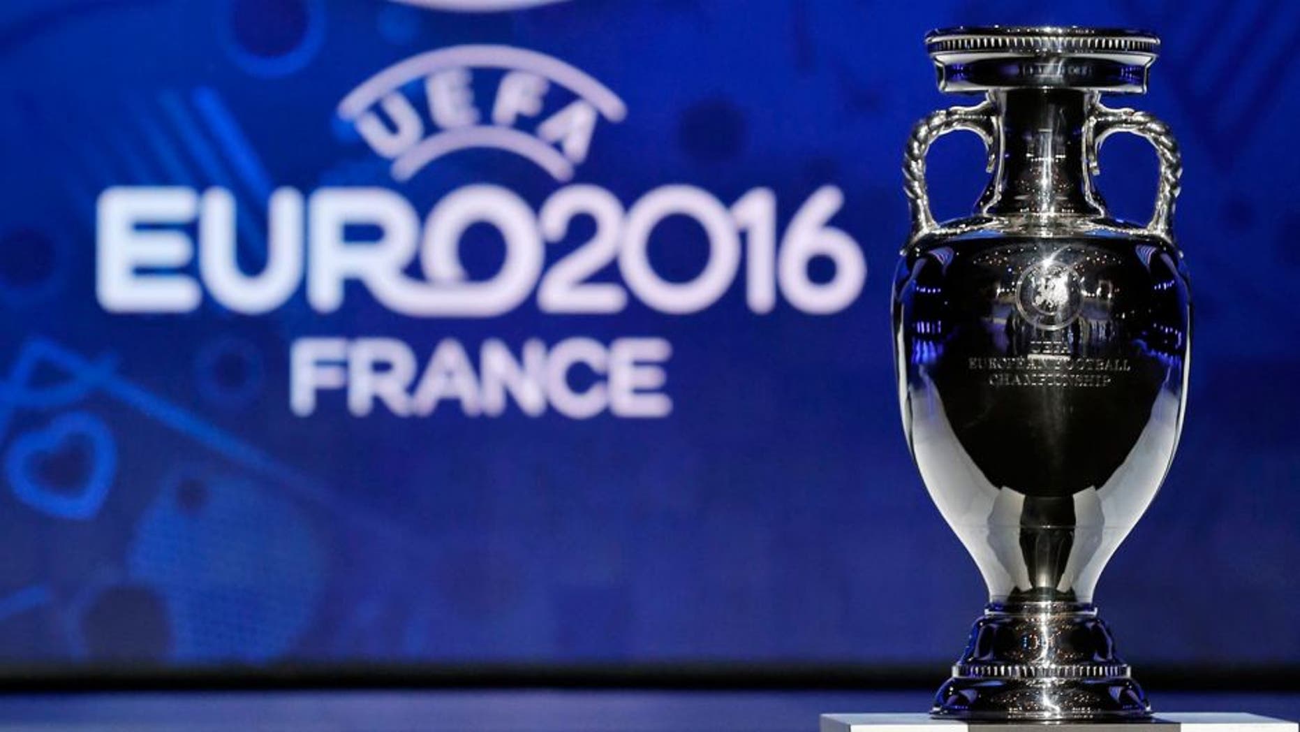 The trophy of the Euro 2016 is seen before the UEFA Euro 2016 qualifying draw in Nice, February 23, 2014. The 53 teams will be split into eight groups of six and one group of five. The top two sides in each group plus the best third-placed team will qualify directly for Euro 2016 in France. The UEFA Euro 2016 will be held in France from June 10 to July 10 2016. REUTERS/Jean-Paul Pelissier (FRANCE - Tags: SPORT SOCCER) Picture Supplied by Action Images